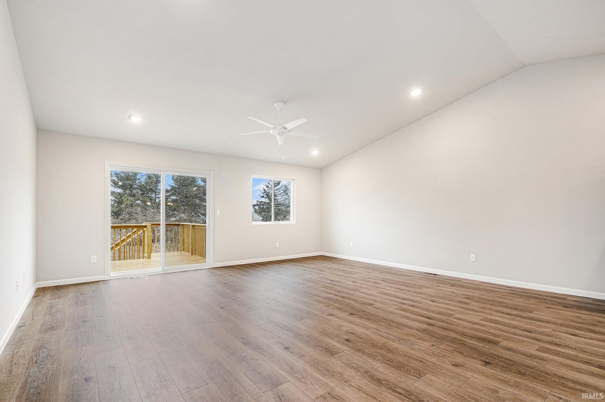 The great room & kitchen feature stunning vaulted ceilings with energy efficient fan and recessed lighting.  The flooring is consistent throughout the great room, kitchen & nook.  Enjoy outdoor dining & entertaining on the 10x10 deck