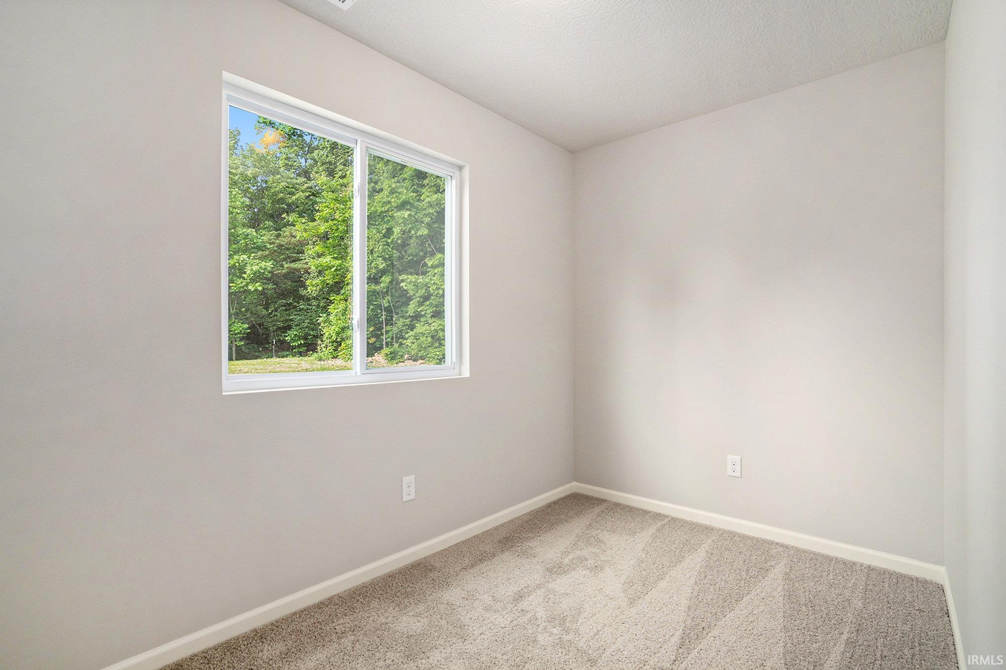 There is a bonus room on the first floor which can be used as a den, study, or playroom.