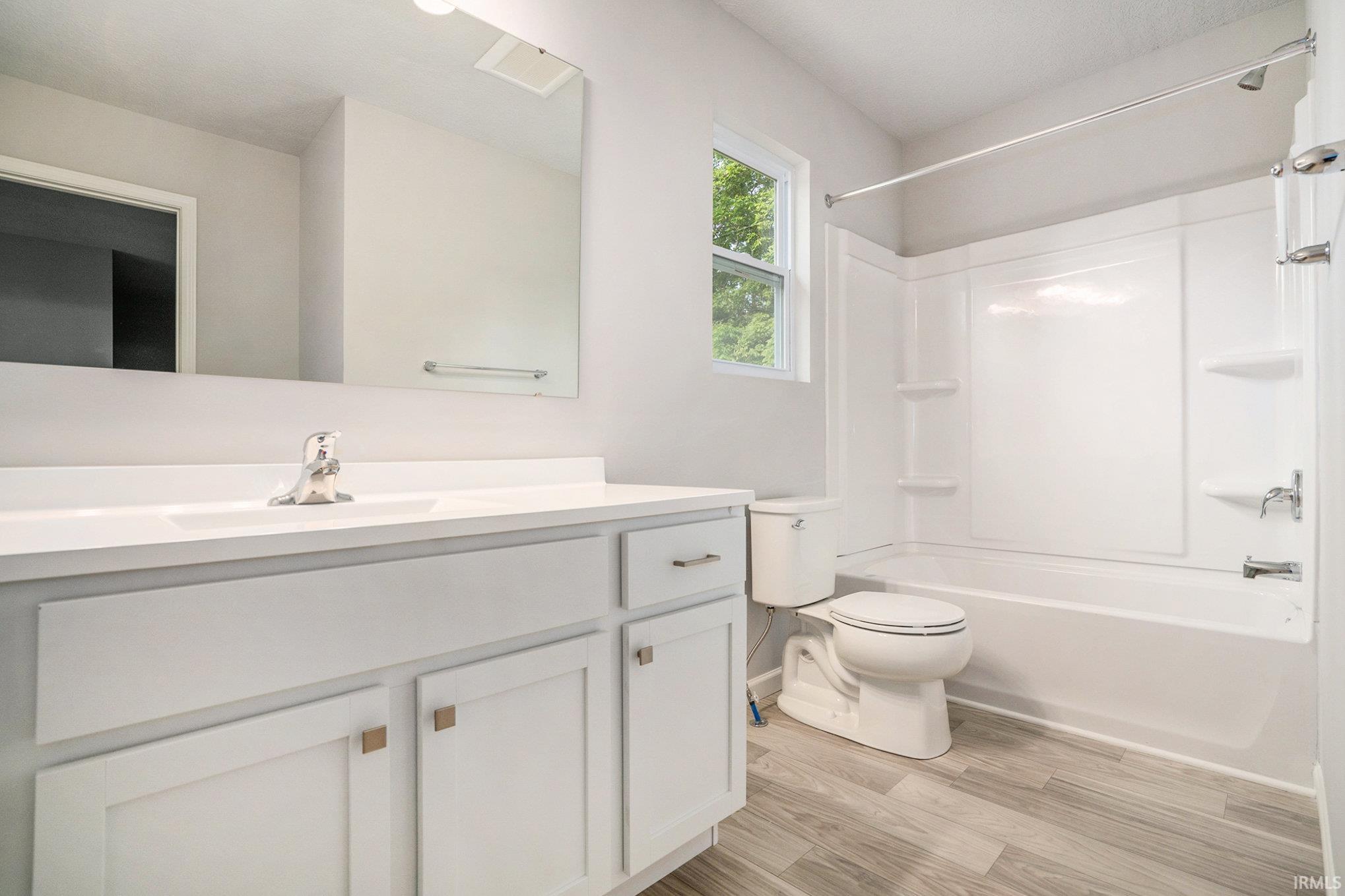 There is a full bath with tub/shower combo located on the second floor.  The exterior window provides natural lighting.