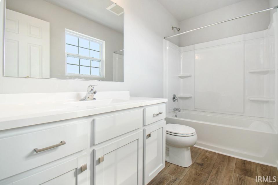Primary bedroom features private bath and large walk in closet