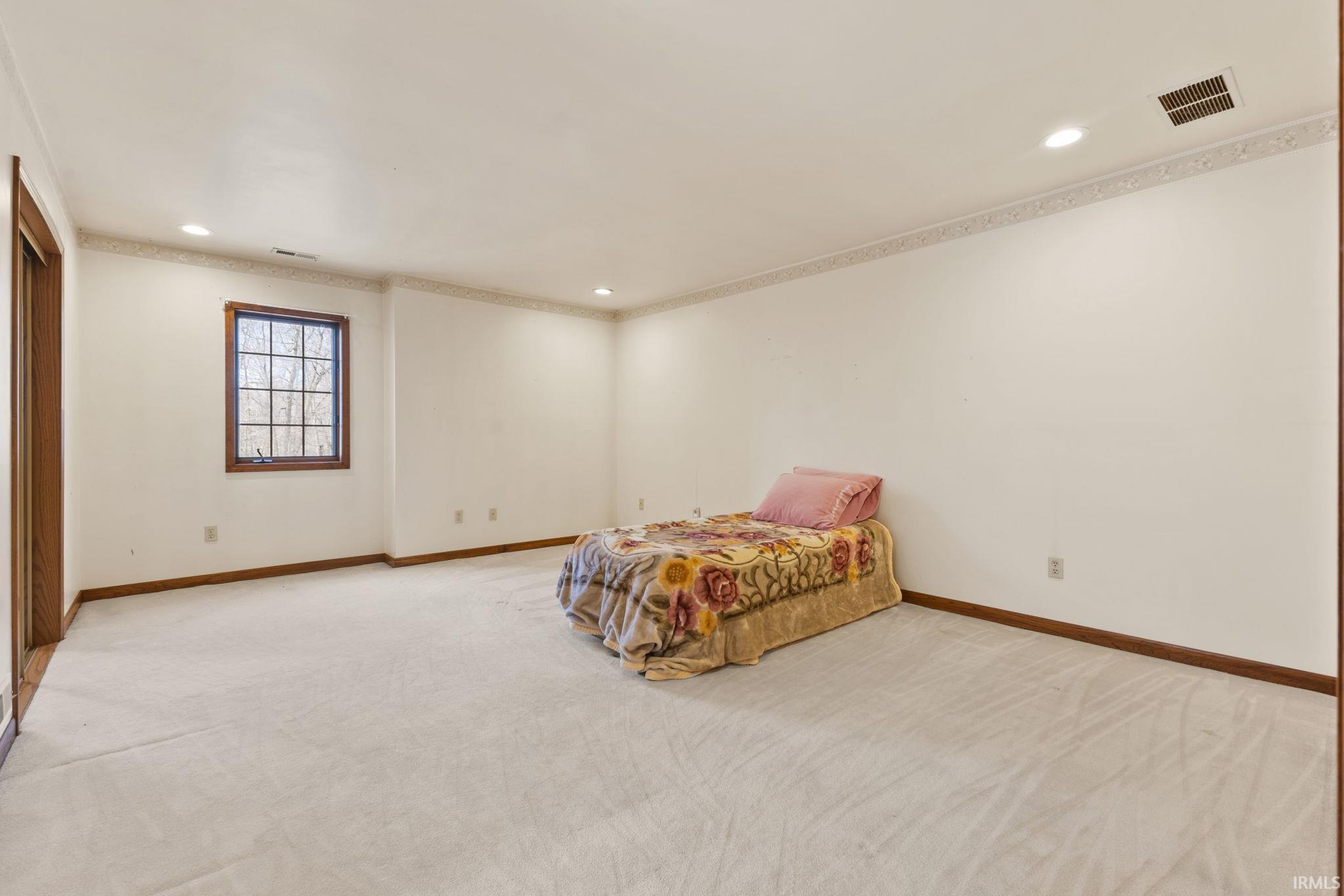 Spacious 4th bedroom with private, ensuite bath.