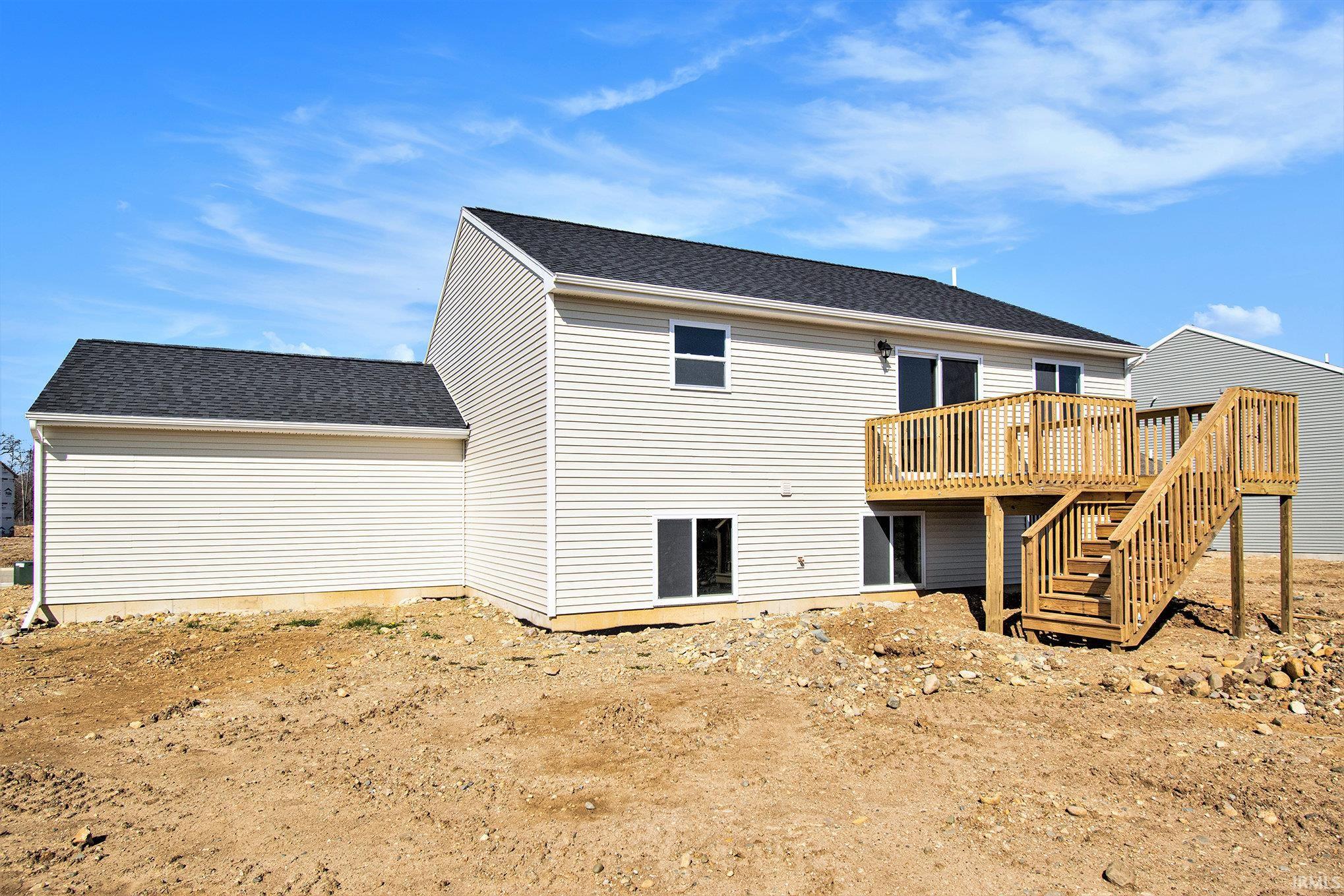Rear elevation, 10x10 deck with stairs from the upper level to the rear yard