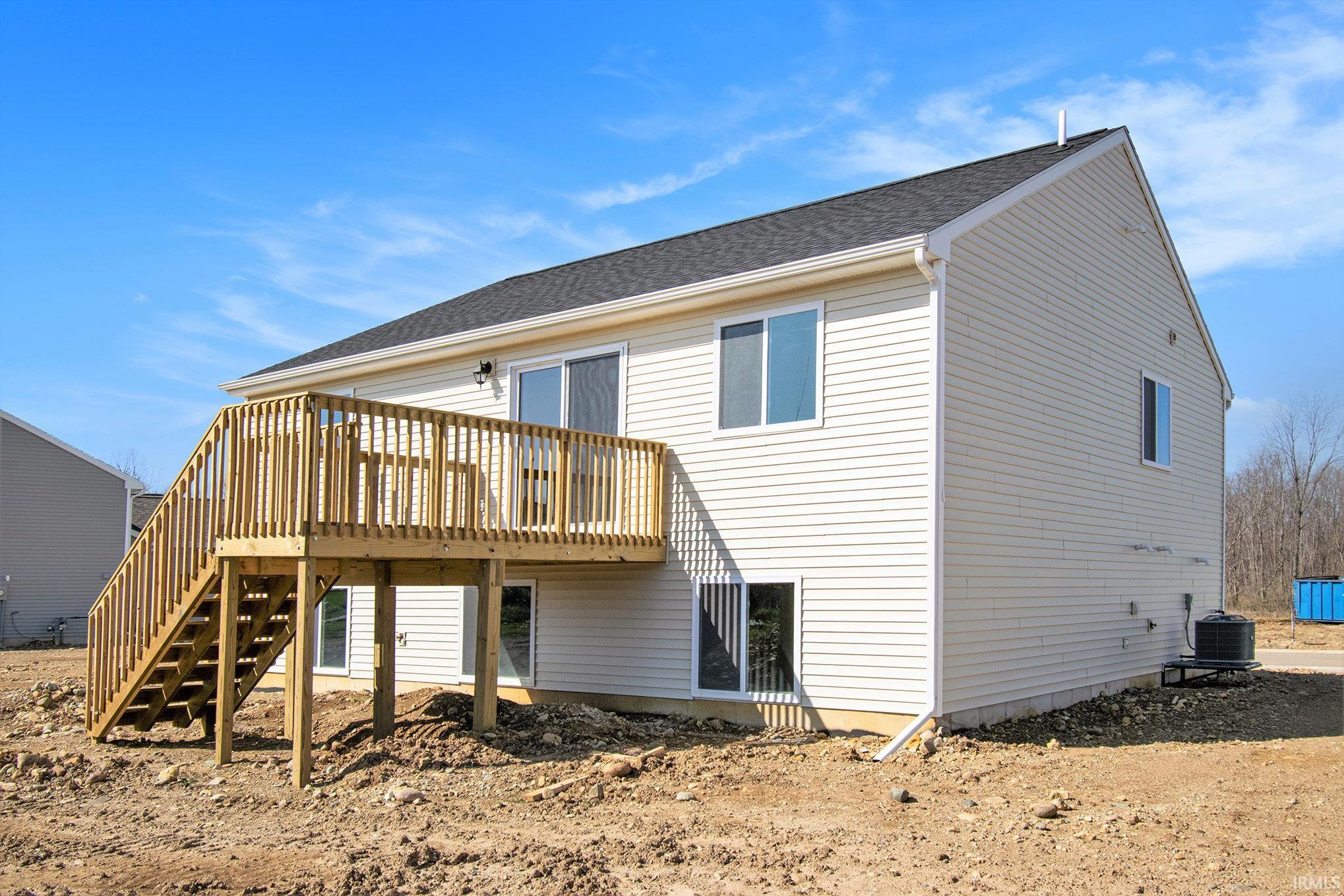 Rear elevation, 10x10 deck with stairs from the upper level to the rear yard