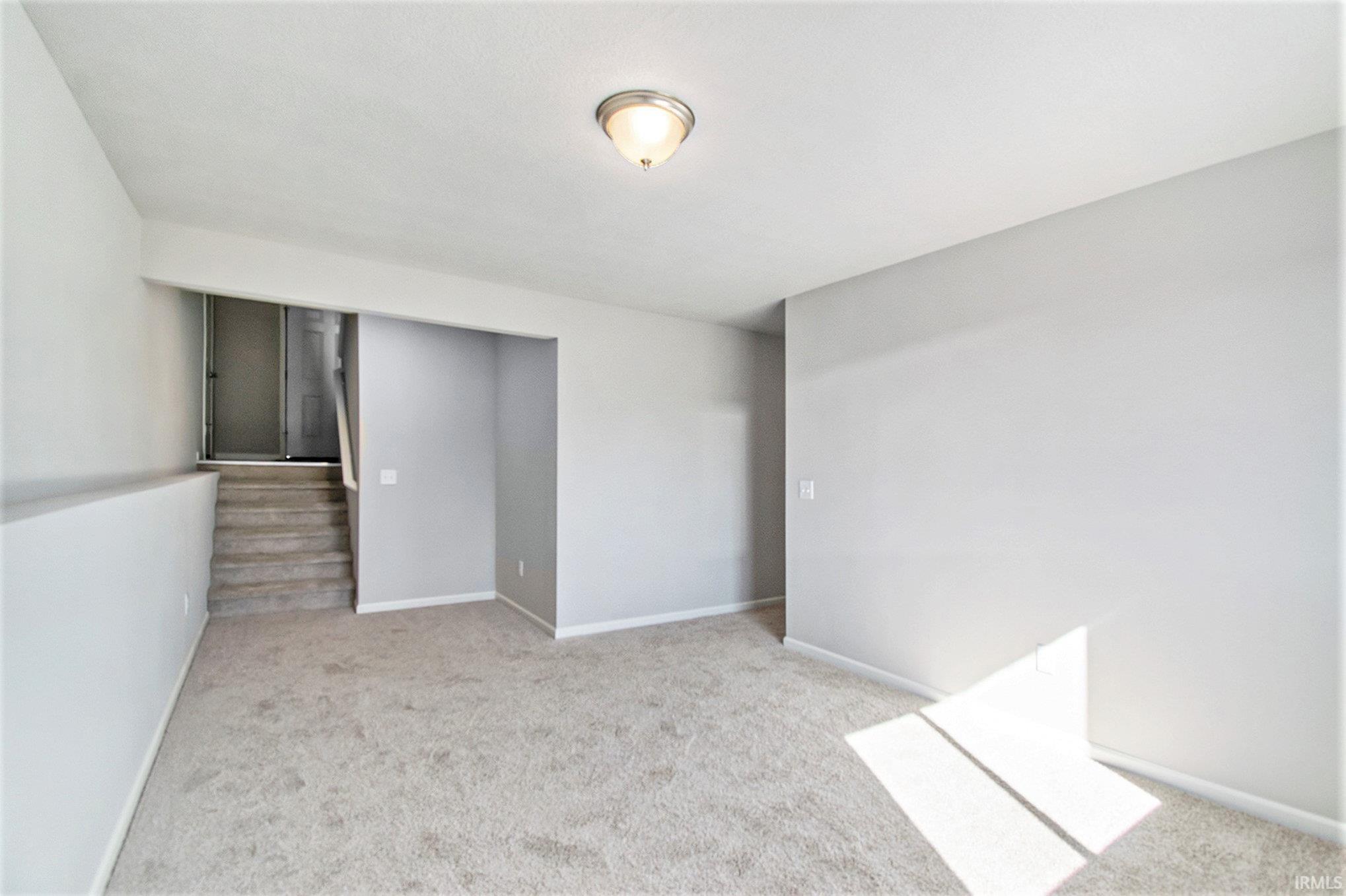 Head to the lower level to find a Rec Room, along with 3 spacious bedrooms, full bath and utility room for storage.