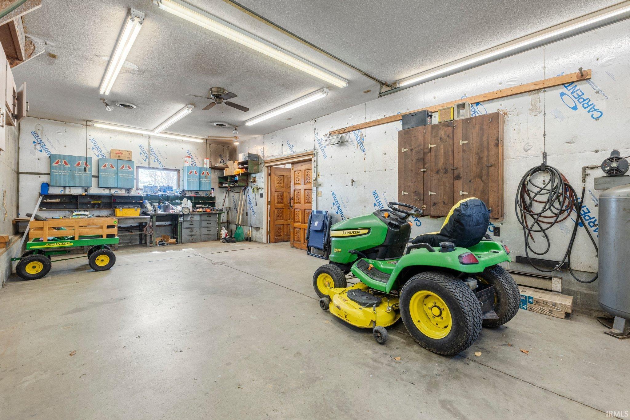 An Outdoor Enthusiast’s Paradise  But that's not all! This property features a spacious, heated and cooled garage with 5 bays, perfect for storing all your outdoor gear, lake toys, and projects.