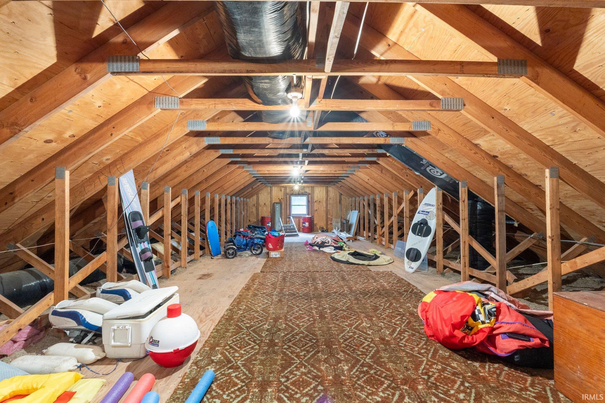 Above the garage, a charming loft provides the perfect bonus room that can be enjoyed year-round. Use it as an extra bedroom, office, or creative space to suit your needs the sky is the limit.