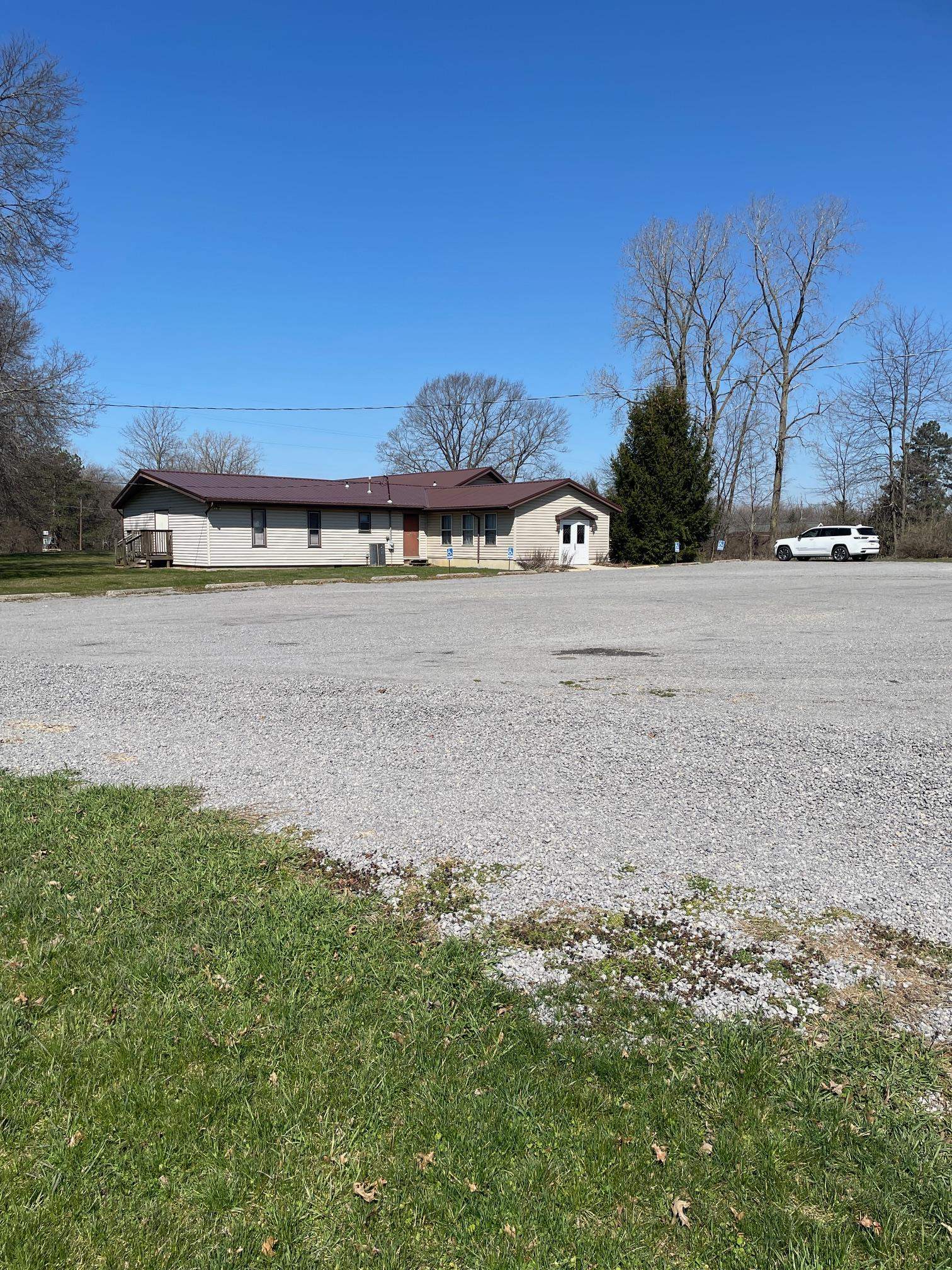 LARGE PARKING LOT WITH COMPRESSED GRAVEL
