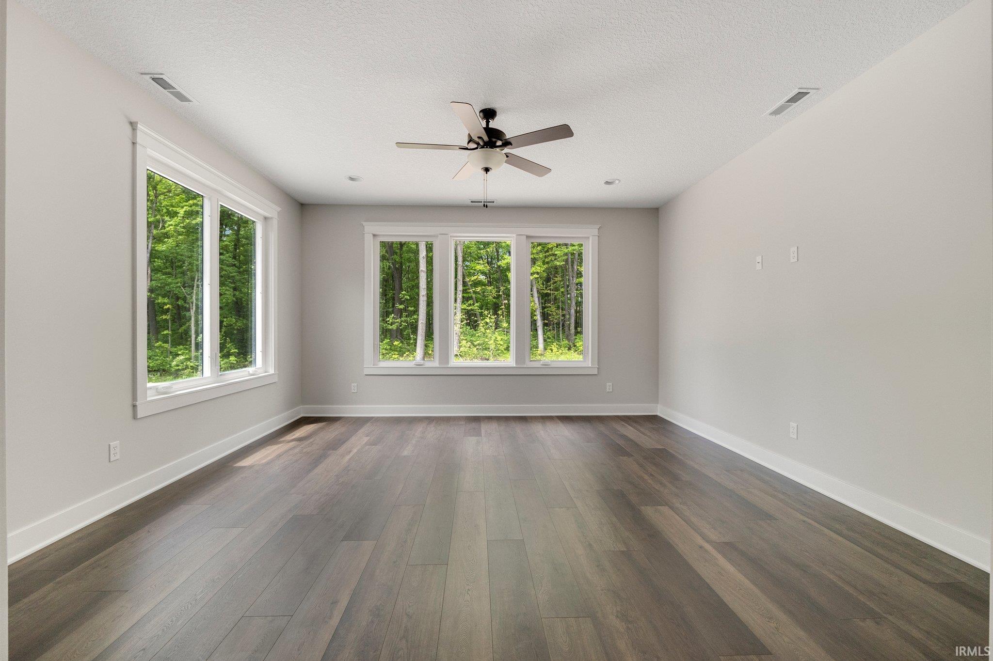 The possibilities are endless as to what you could use this amazing space for. Hidden behind 2 custom barn doors. Light and bright with views of nature.