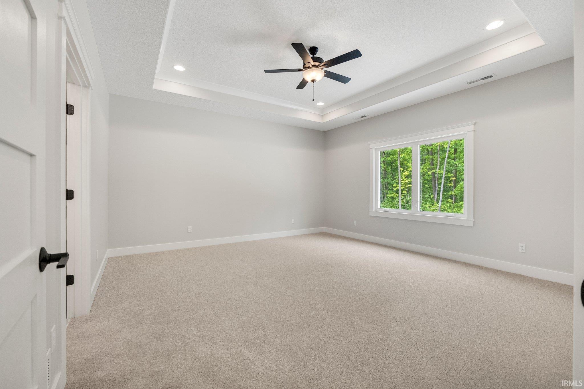 Spacious Master Suite w/Trey ceiling & Crown Moulding. Light and Bright overlooking Gorgeous wooded backdrop! Mohawk smart strand carpet in all bedrooms w/limited lifetime pet stain warranty on carpet. Ask for Brochure.