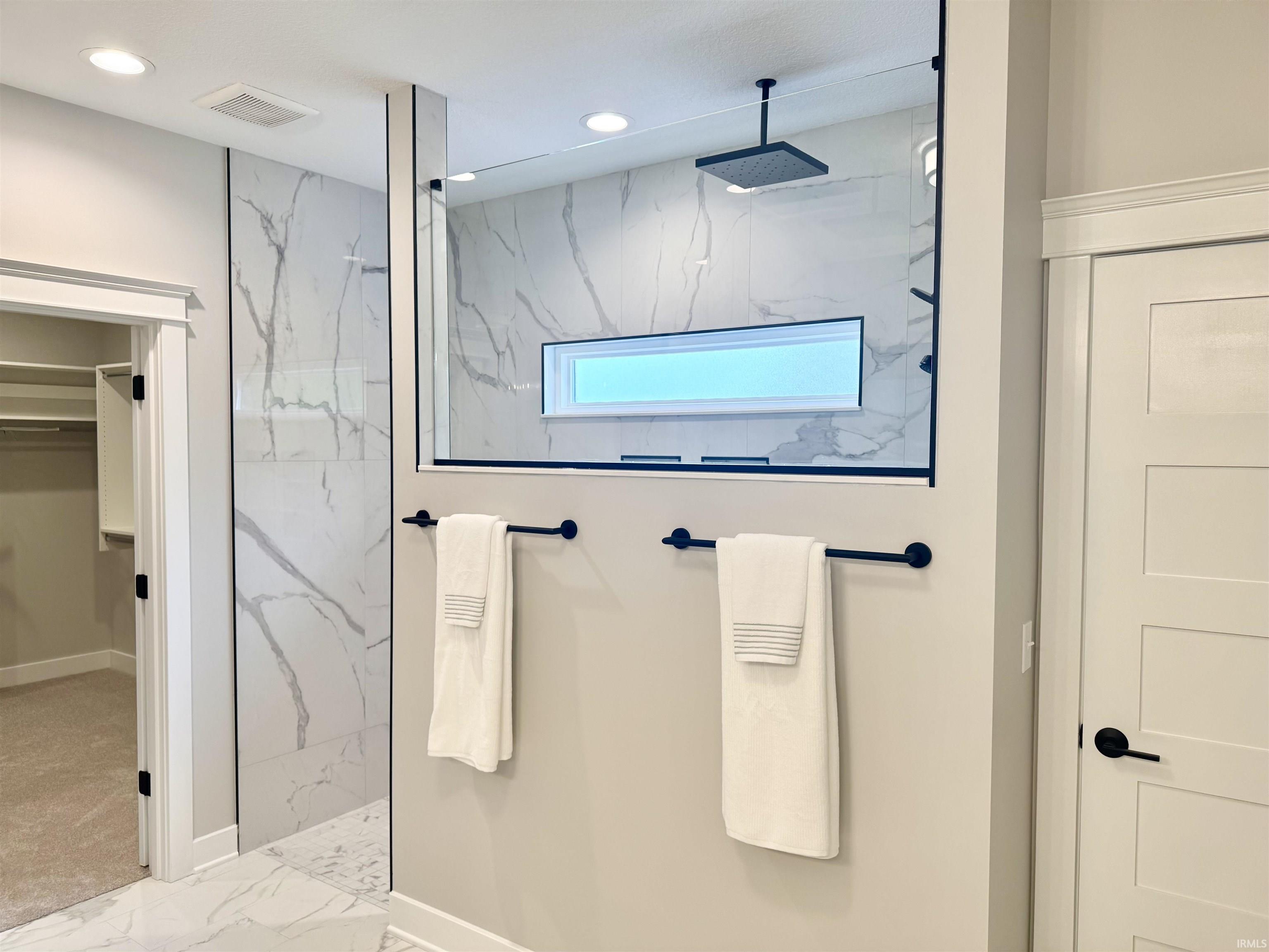Plenty of light in this wonderful 8Ft custom built tile shower. 12