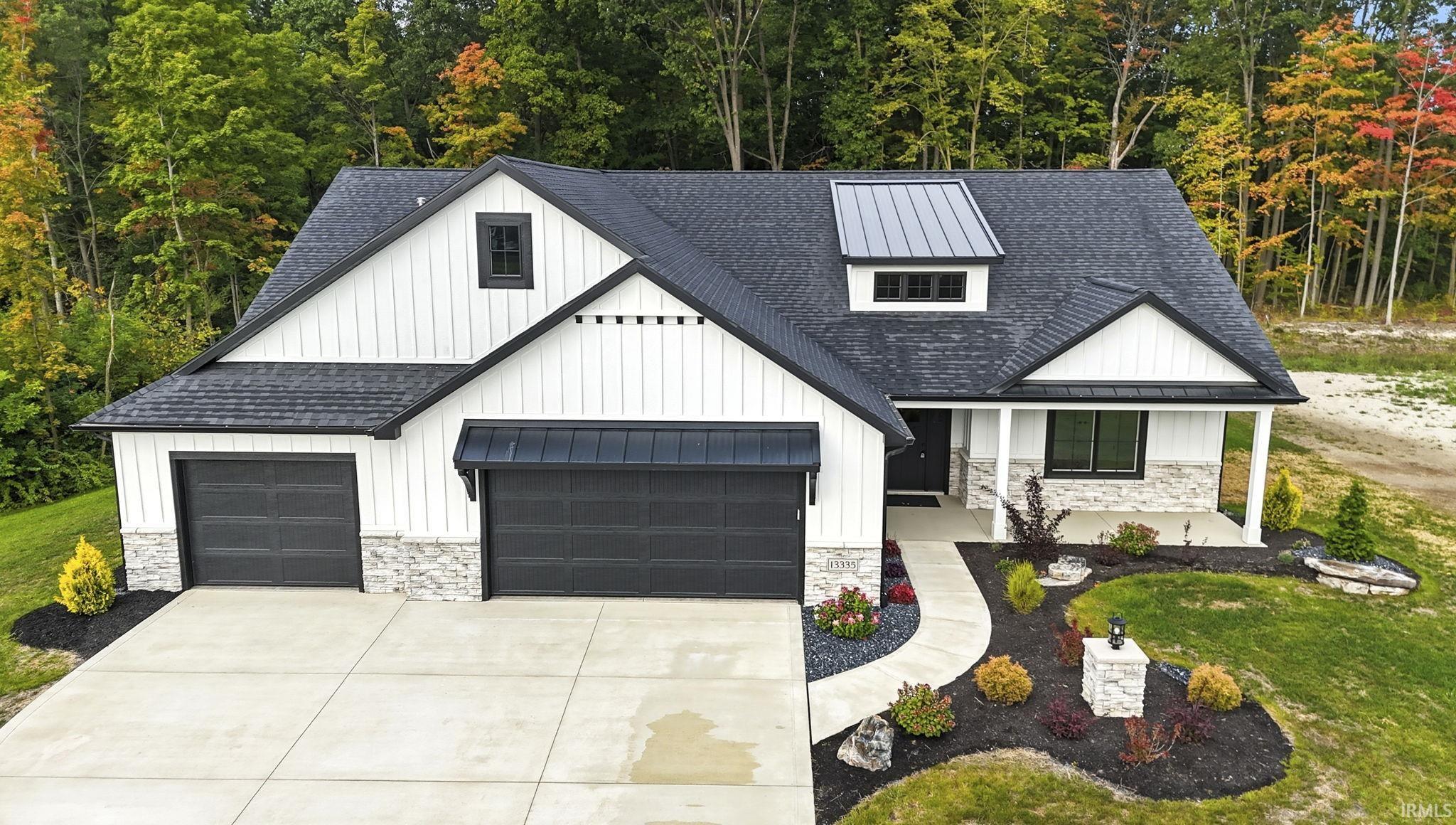 Stunning wooded backdrop on two sides to enjoy nature all around! 2715 SF w/so many amazing features! Call today to view and receive your Feature sheet showing all the attention to detail this Beauty offers! Hard to find location in Leo Schools!