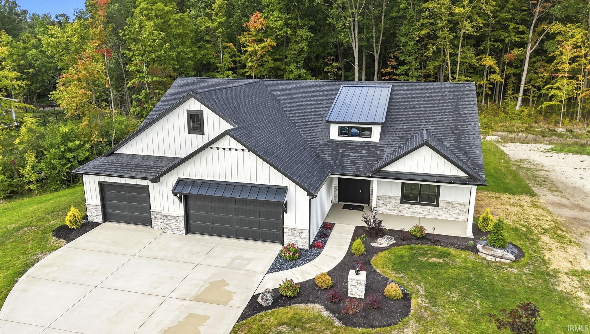 Notice the attention to detail as you walk through the Beautiful landscape this home has to offer. From the brick light post to the covered front porch, this home has more than meets the eye!