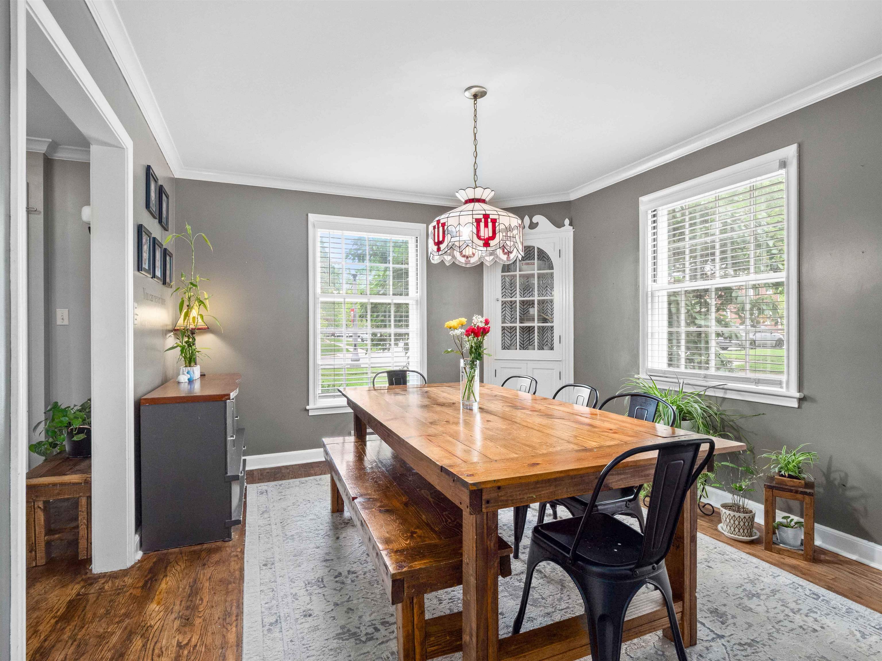 Formal Dining Room w/ Crown Moulding & Built-In Cabinetry.