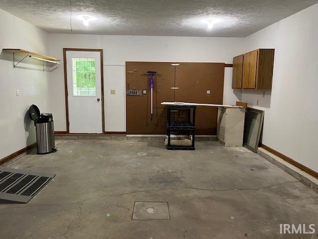 Garage with Pegboard, Cupboard, Shelving,