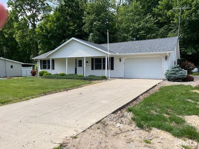 Front of house, front porch, concrete driveway