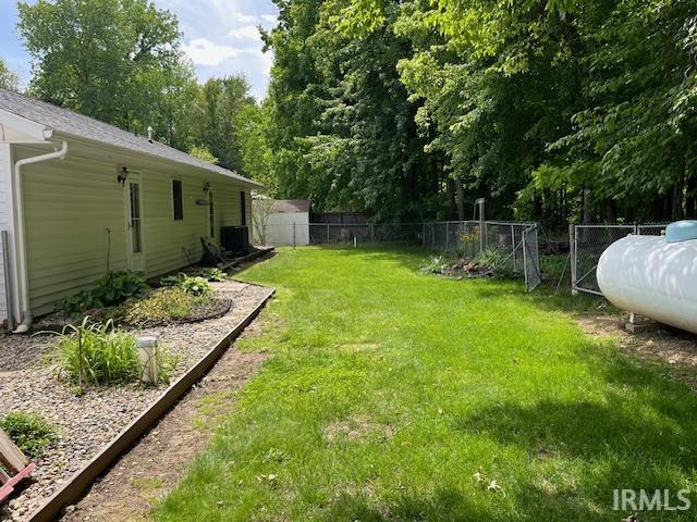 Fenced backyard with view of classified forest and wildlife
