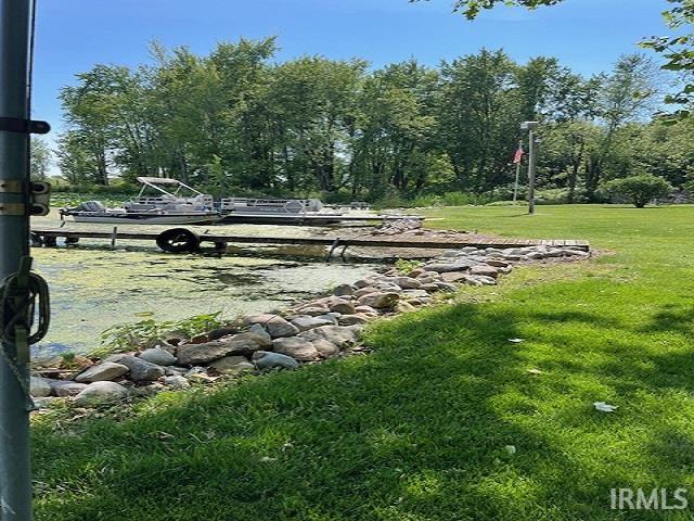 Deeded Private Sandy Beach Easement including pier-Shared with only one other property owner. Glacier Stone Seawall.  Lake has gravel bottom.