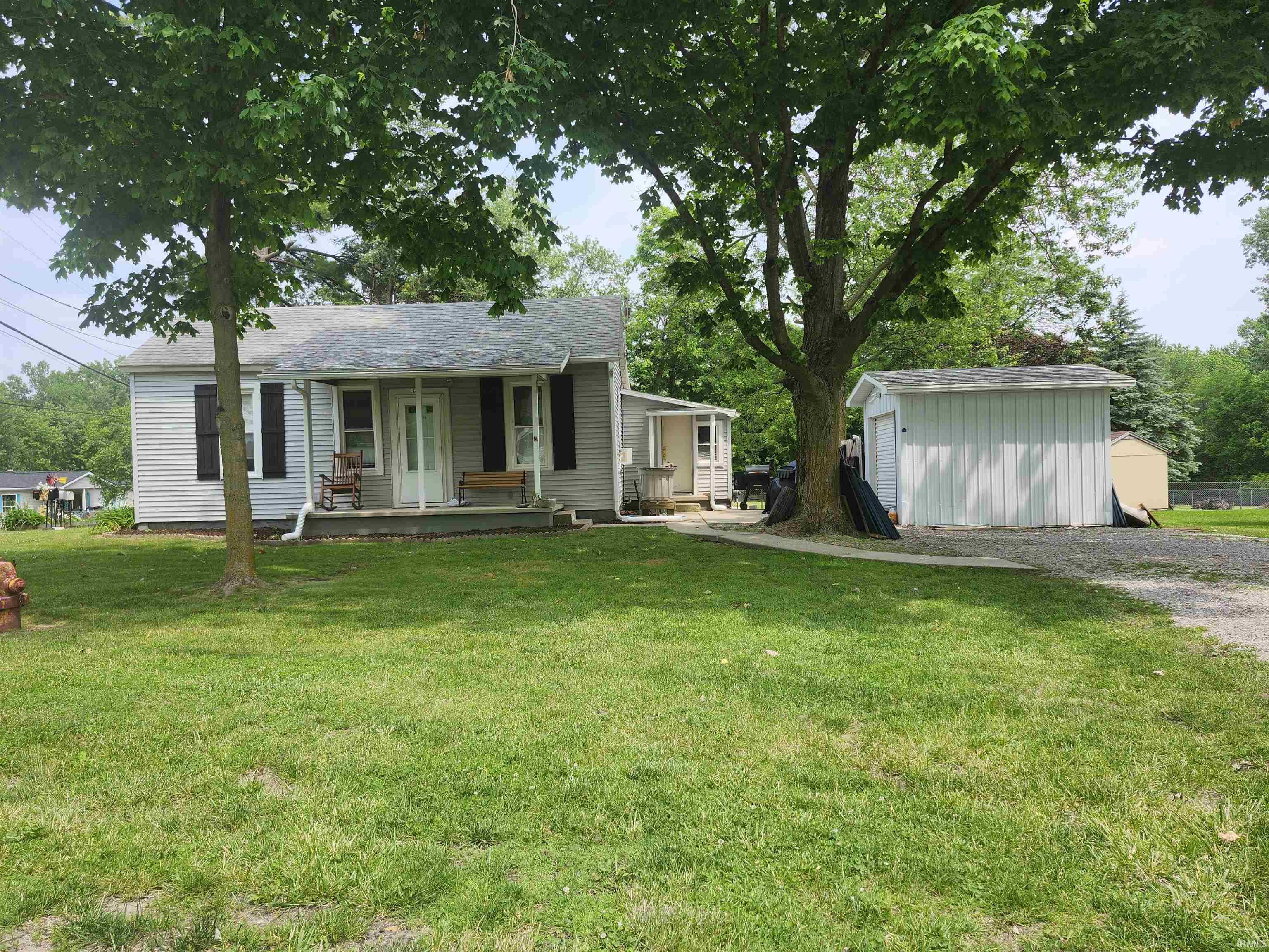 Start Showing Date: 6/18/2025 Very cute and tidy small ranch home located in a corner cozy setting in Columbia City.  If you are now a renter looking to buy, an investor or someone looking for a home that won't break the bank, this home may qualify!  Currently the home is being used as a 2 bedroom, but the second bedroom does not have a closet.  The laundry hookups are on the main floor and there is a partial unfinished basement.  The shed provides a perfect storage space for the lawn equipment and possession is available at closing!