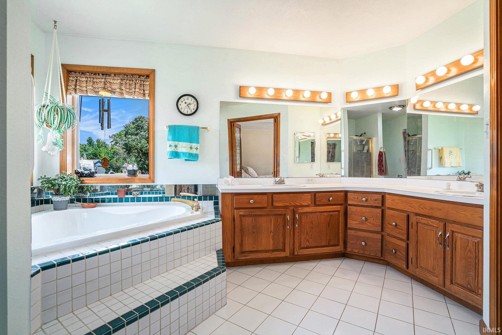 Large Primary Bathroom with Jacuzzi Soaking Tub, Stand Up Shower & Double Vanity
