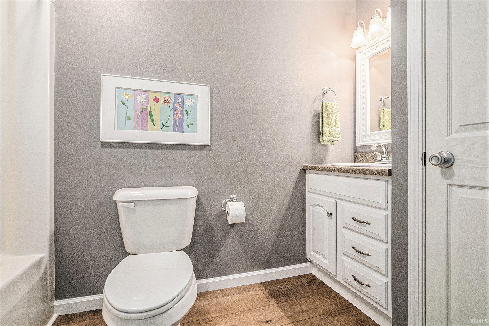 This full bath is located upstairs with 3 of the bedrooms.