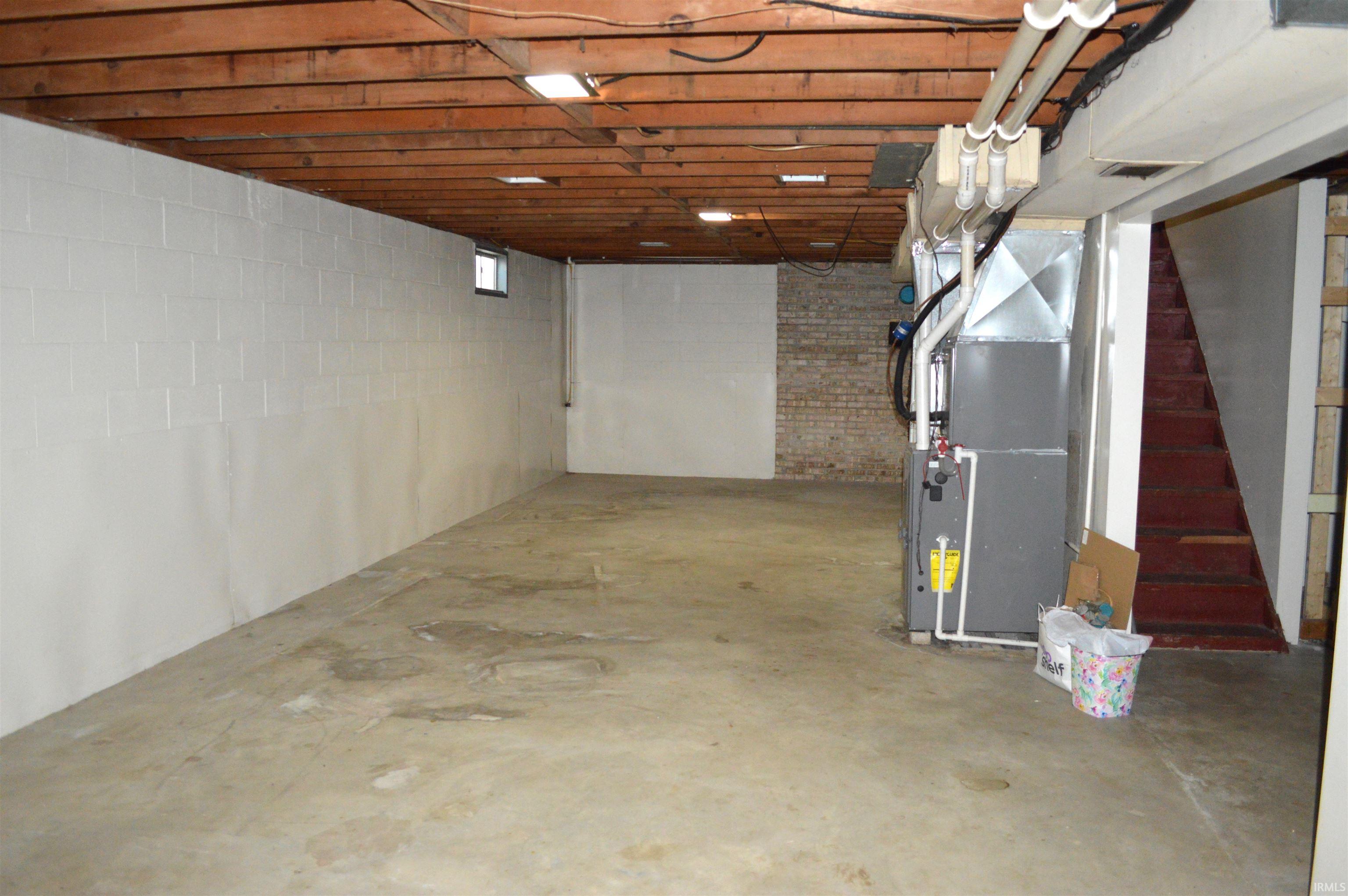 Large, unfinished basement ready to be converted.
