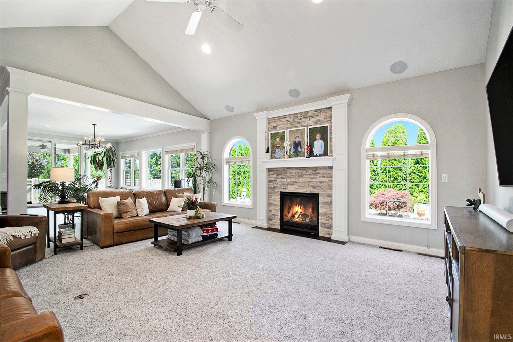 Gas Fireplace, Open to Foyer, Dining Room and Kitchen