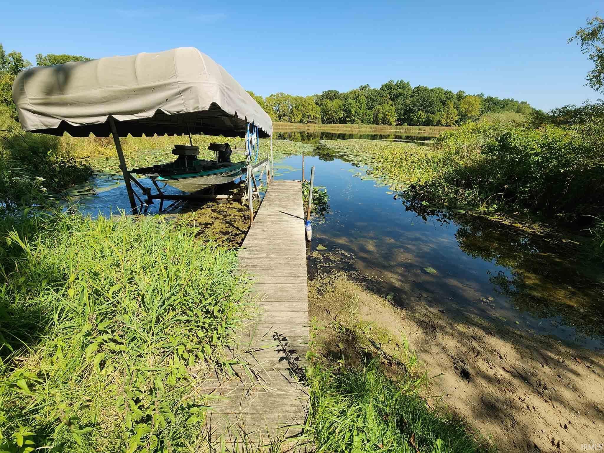 Boat Launch is approx 6/10s mile on SW shore in West End of Walters Lake in Area 5 on reference sheet.
