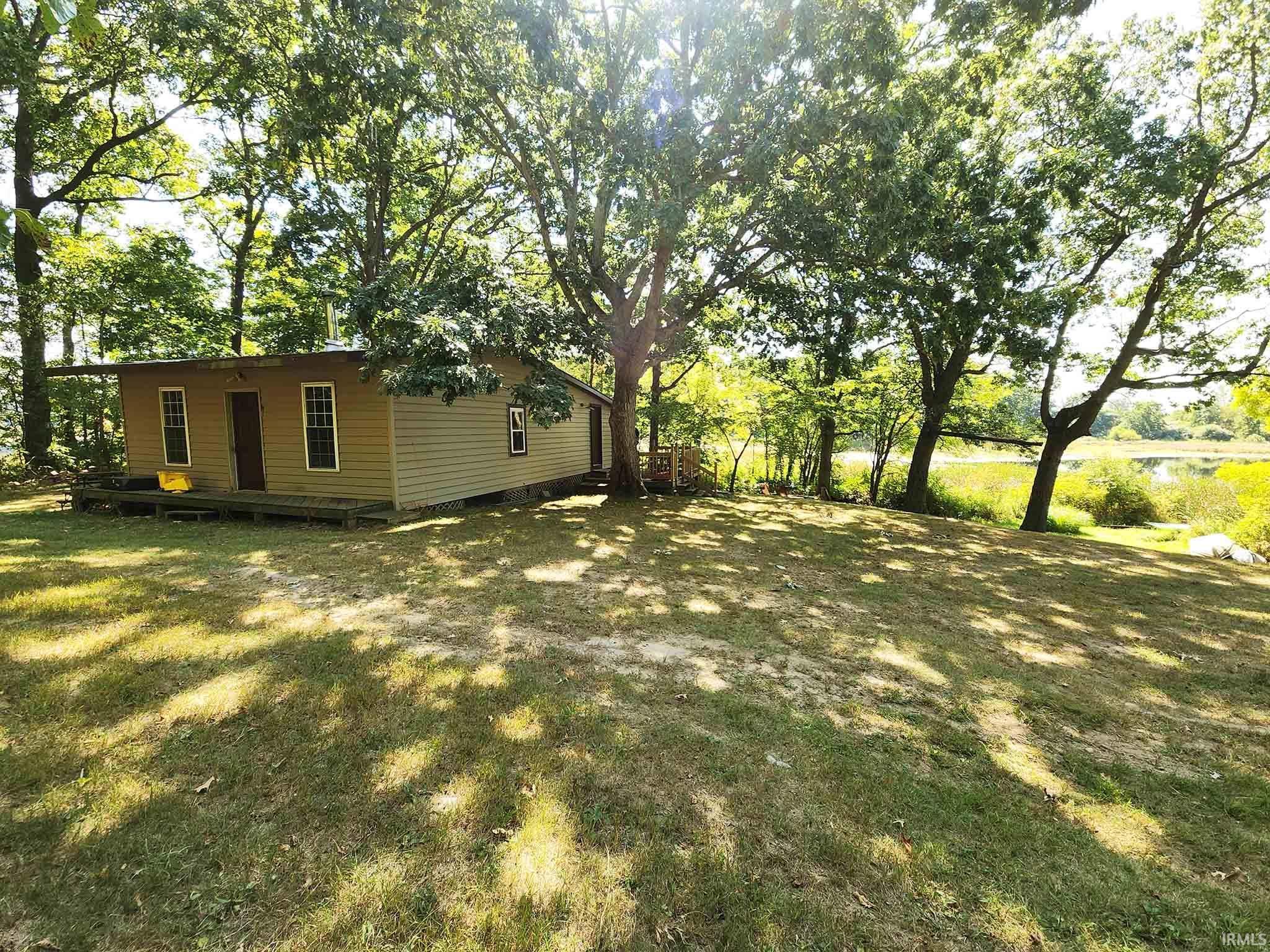 Lakefront Lodge powered by generator in deep NE woods. (in Area 1, NE Woods on Reference sheet)