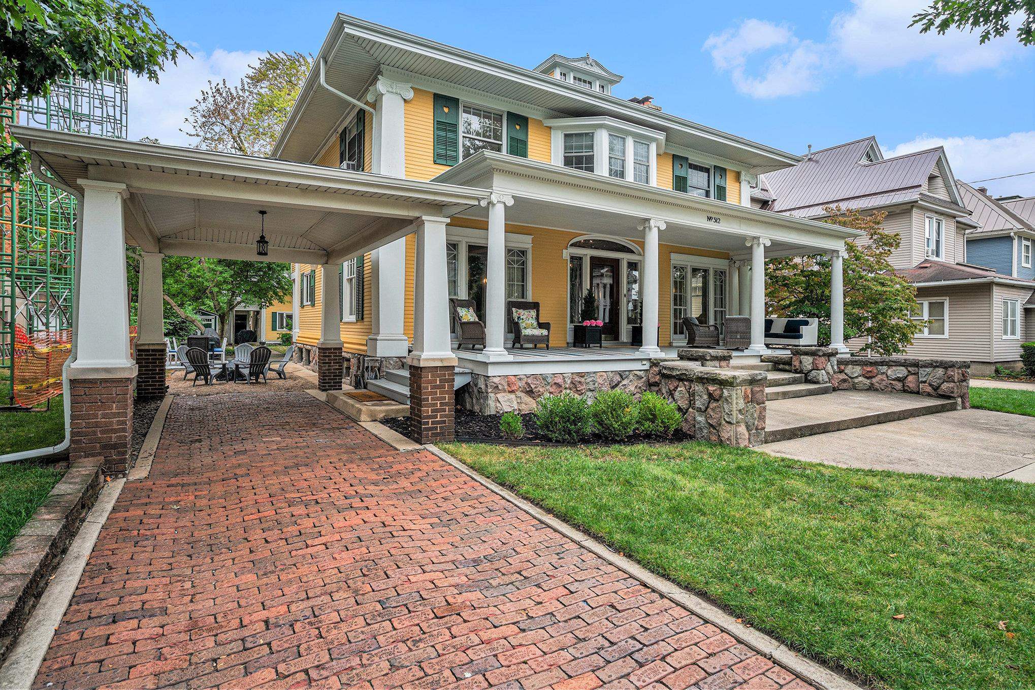 Brick driveway to carport.