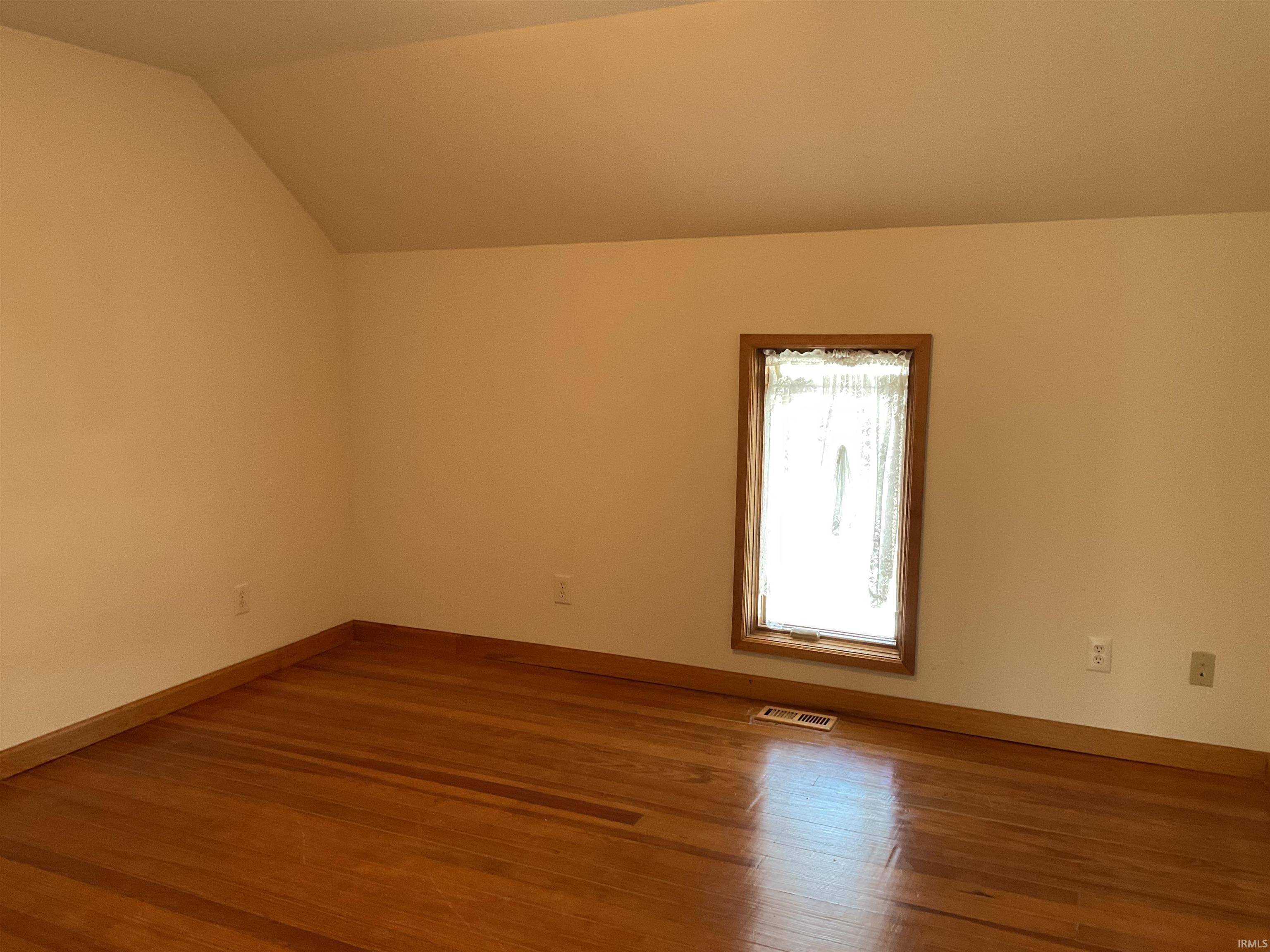 2nd floor bedroom with wood floors