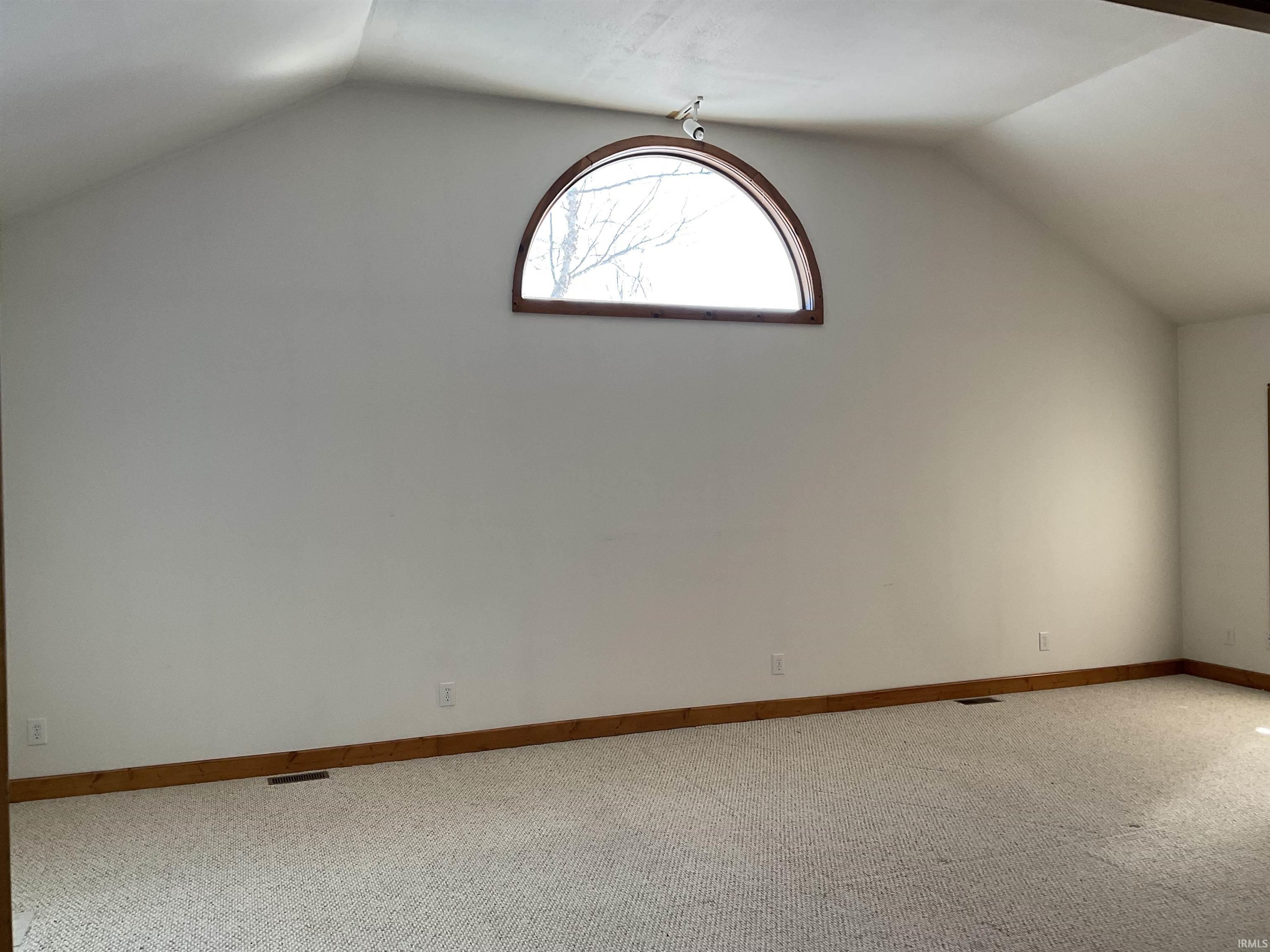 1st floor bedroom with doors that open to deck
