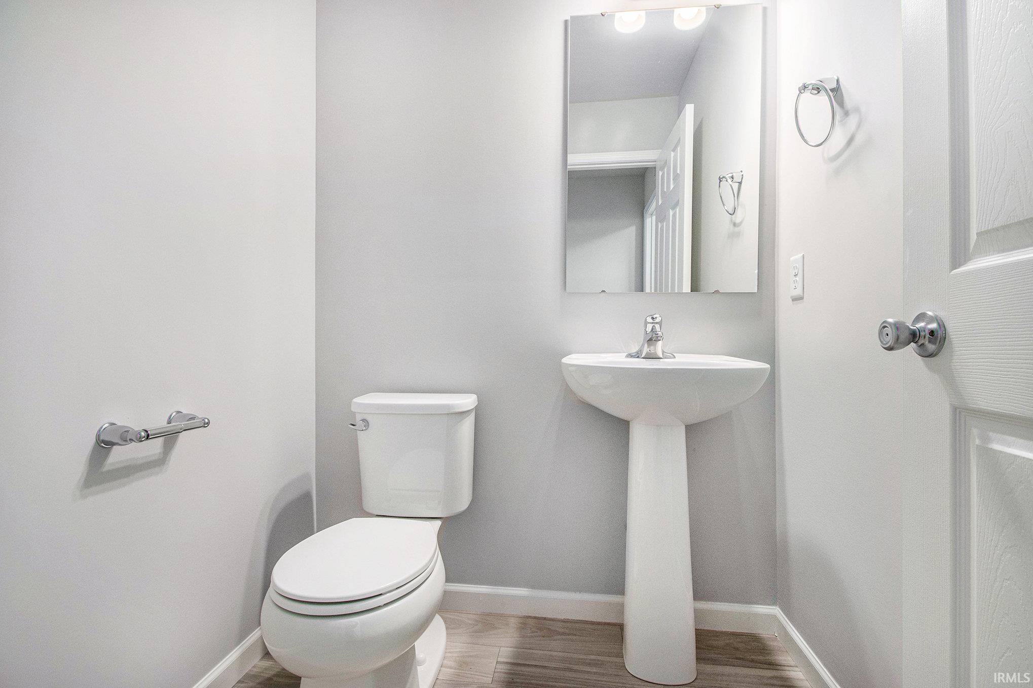 First floor powder room is centrally located and easy for guests to use