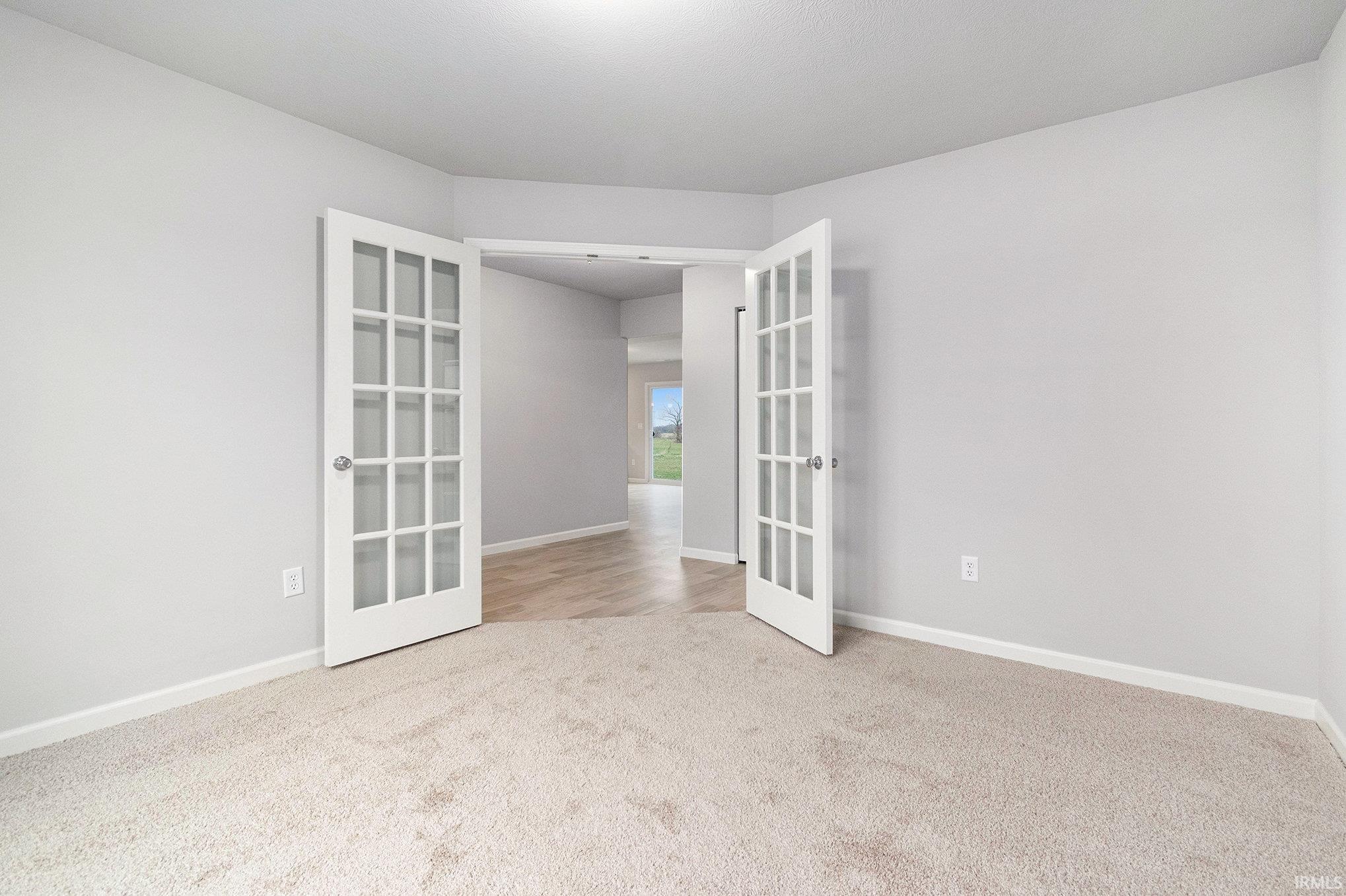 This traditional 2 story home included 4 bedrooms upstairs plus a den with French doors on the first floor.