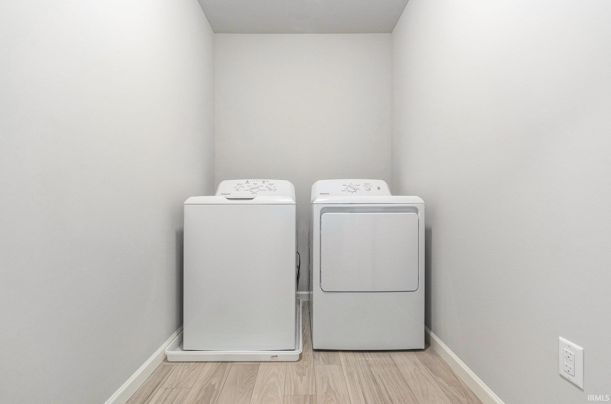 The laundry room is situated near all bedrooms and includes the washer & dryer!