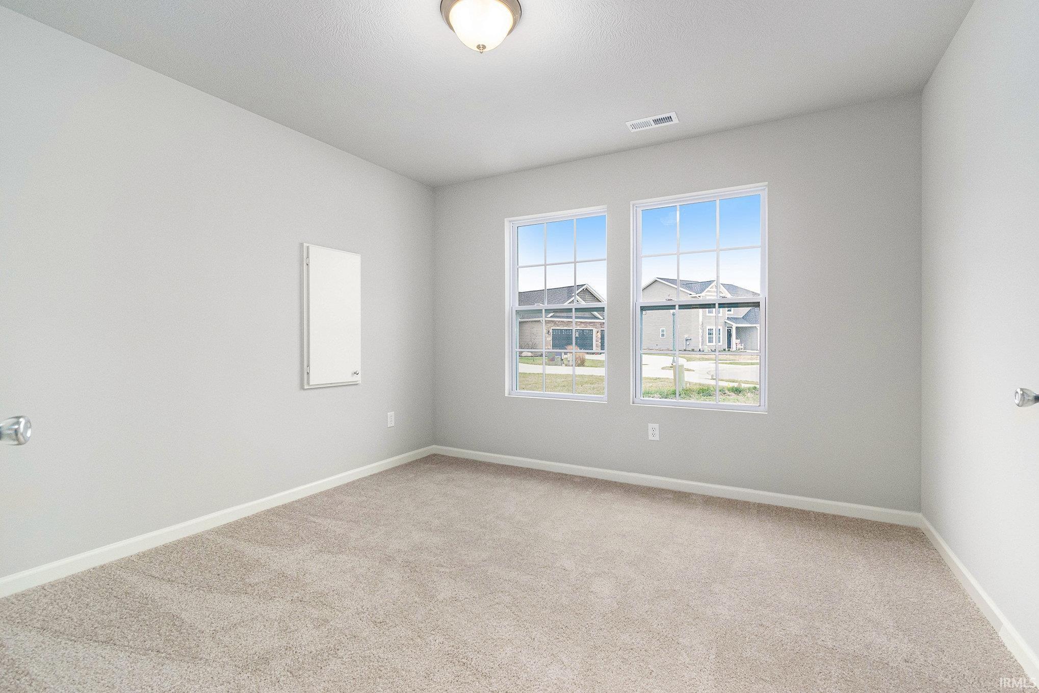 The den has ample lighting, French door entry and would make an ideal office or study room.