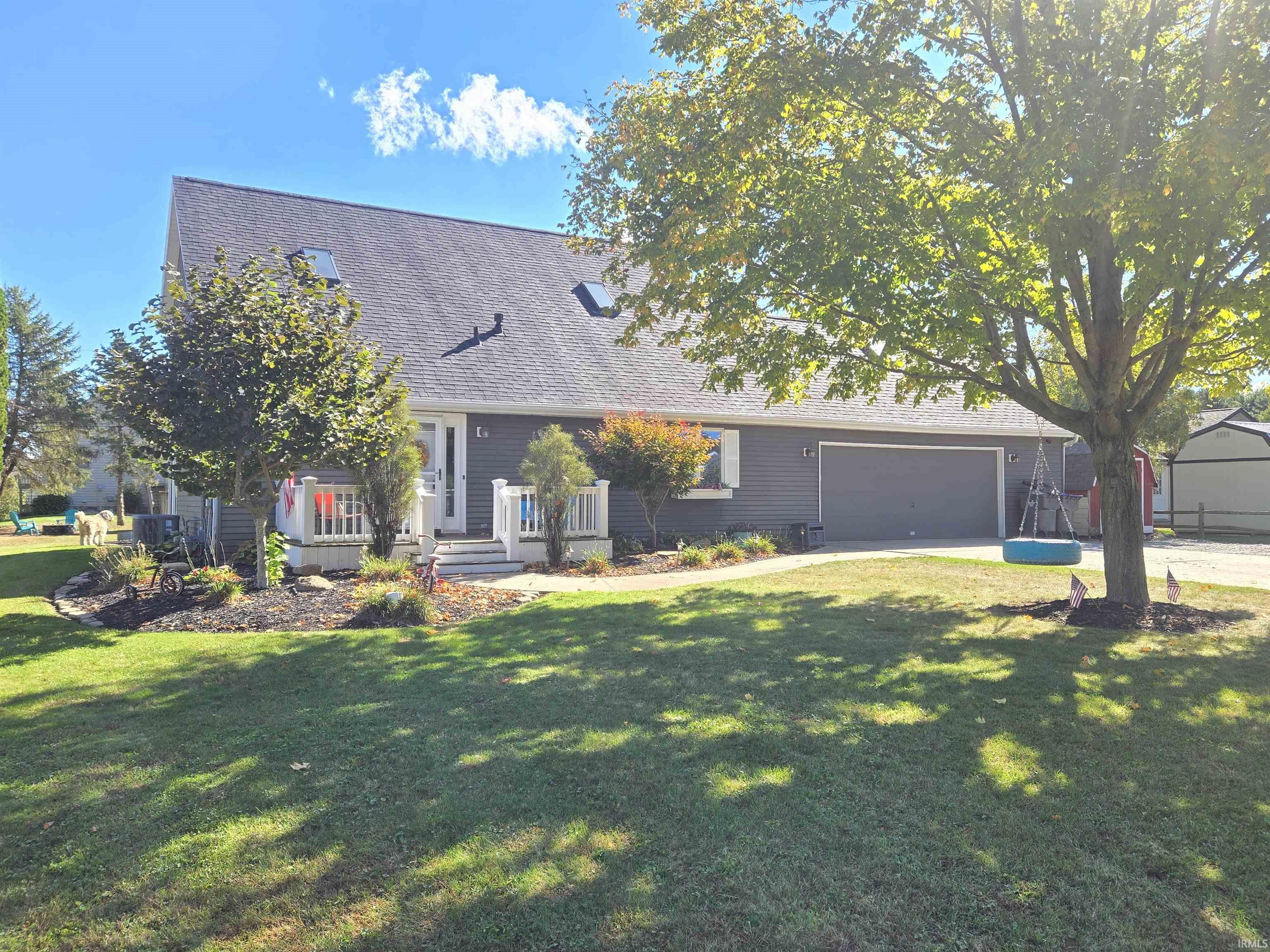 Any day you can spend on the lake is a good day!  Now is your opportunity to actually live at the lake.  Located on the west Side of Dewart lake near Syracuse, IN, this spacious 3 bedroom 2 bath home has so much to offer the entire family and friends.  With combined 2900 sq ft of finished area that includes an open floor plan of the kitchen, dining and living rooms that all sit under the massive vaulted ceiling with exposed beam structure. Hangout and watch the game in the large family room located in the basement or entertain in the large back yard under the covered porch and around the below ground pool!  Need storage, then the oversized 2 car attached garage has it for you.  This home also comes with a deeded pier slot and swim area that is part of the association which is all withing a short walk from the property.  House has had many recent updates.  Speed boat and boat lift are available for purchase.