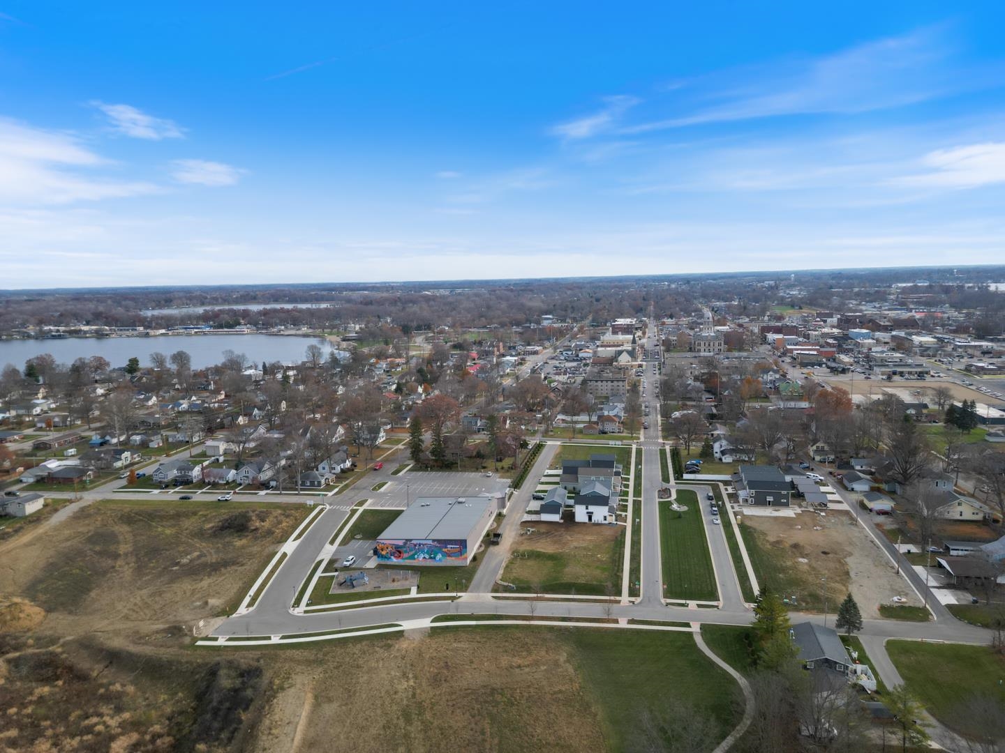 Aerial view of property's location with a nearby body of water