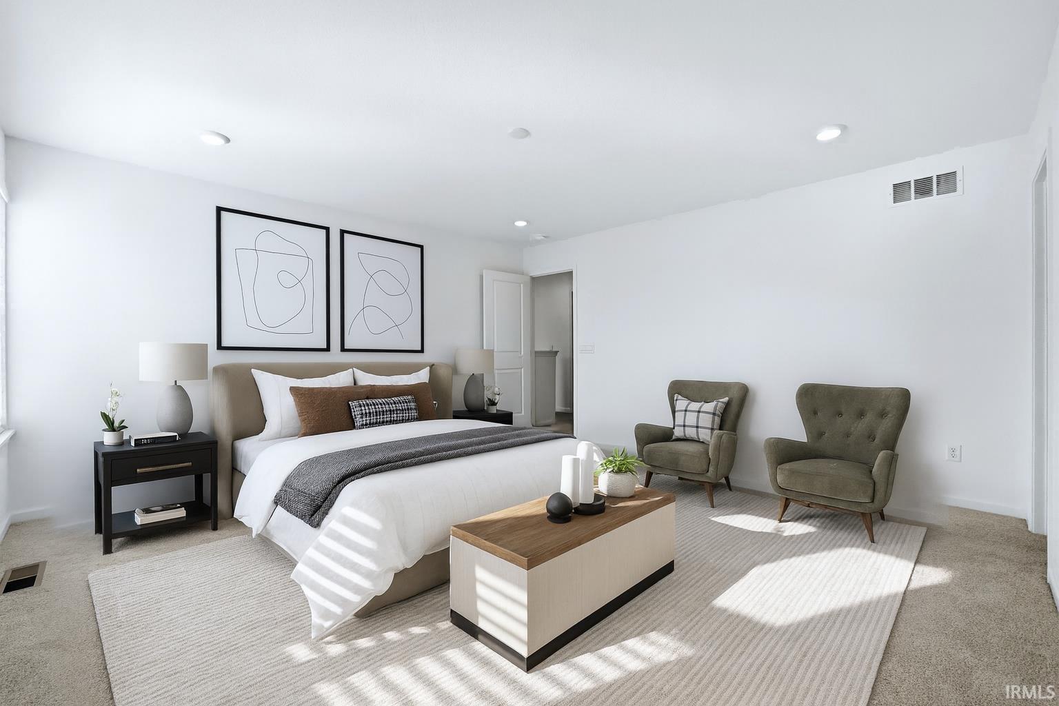 Carpeted bedroom featuring recessed lighting