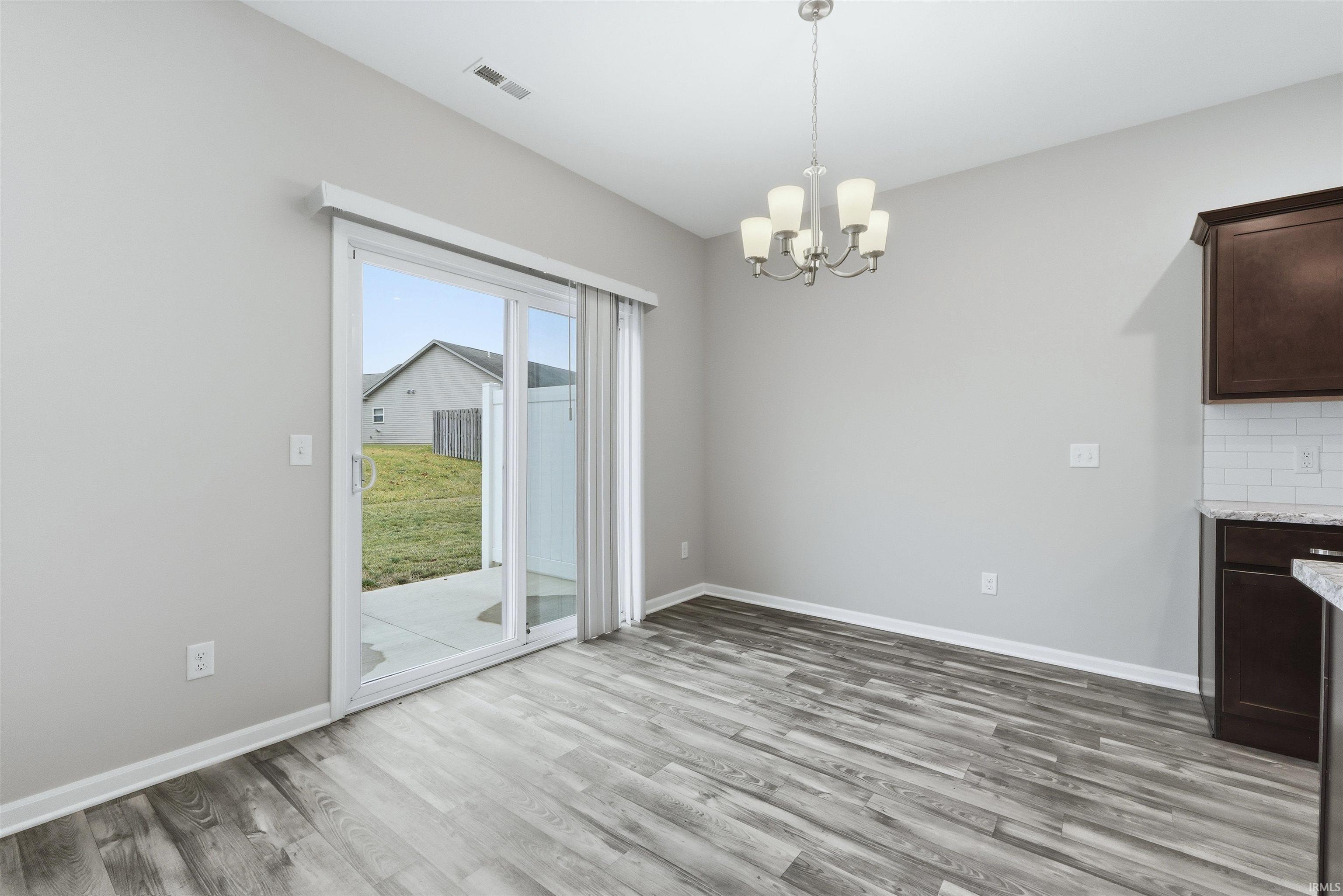 Nook featuring light vinyl plank flooring