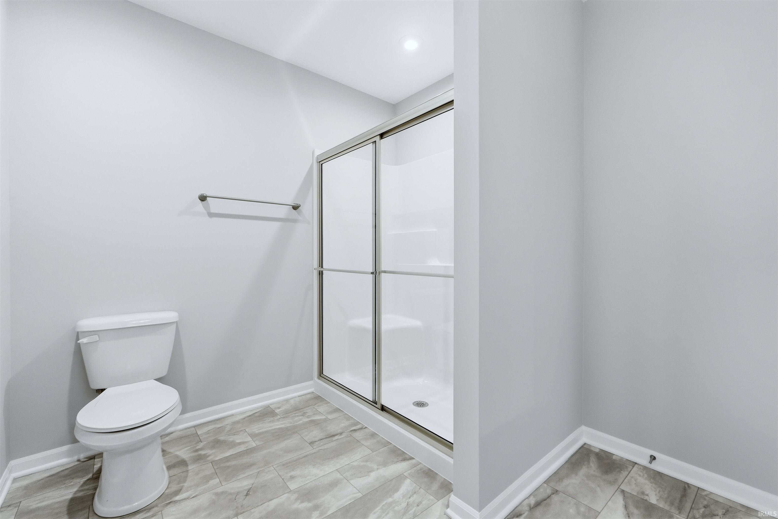 Owner Suite Bathroom fiberglass Shower with door