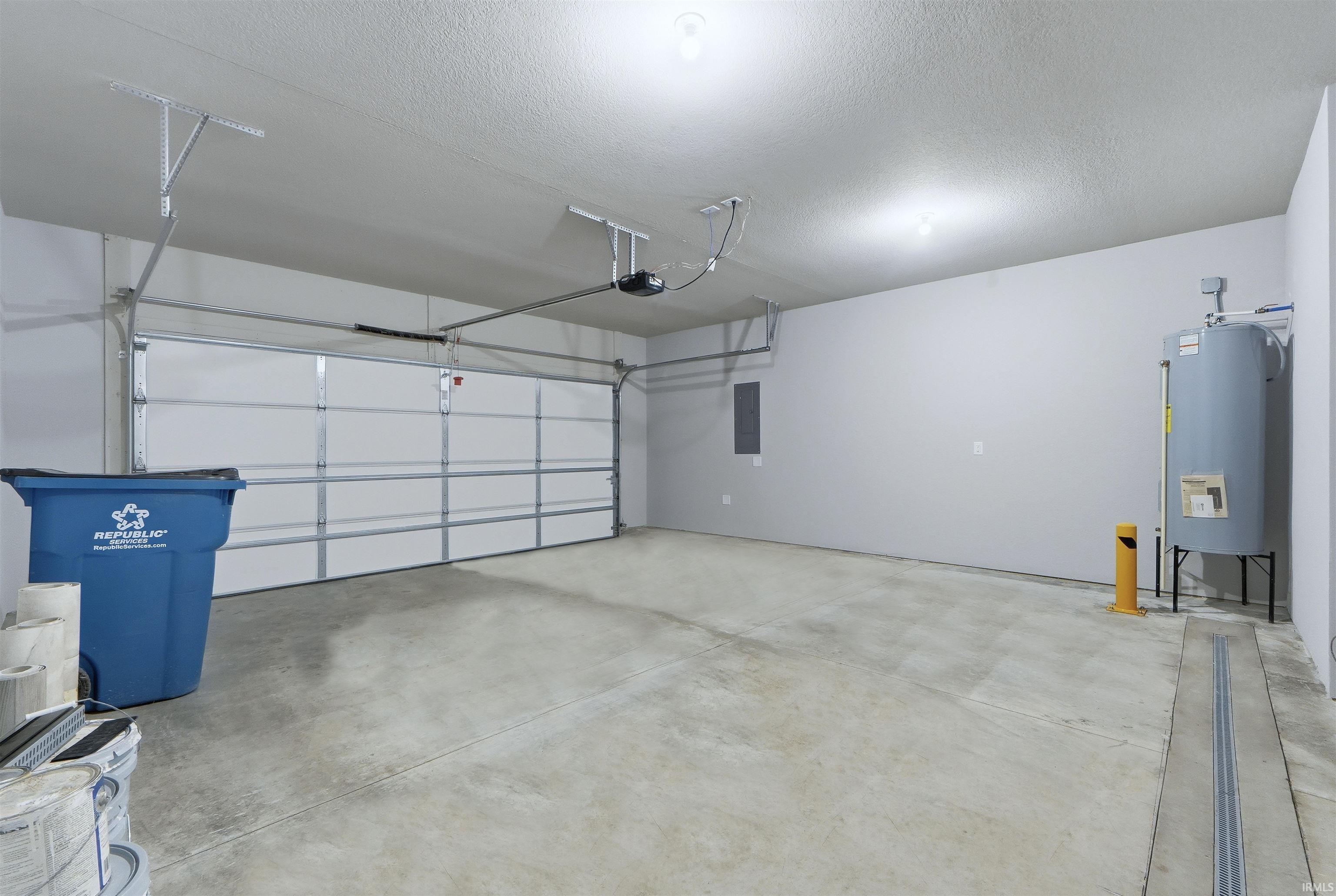 Garage featuring electric panel