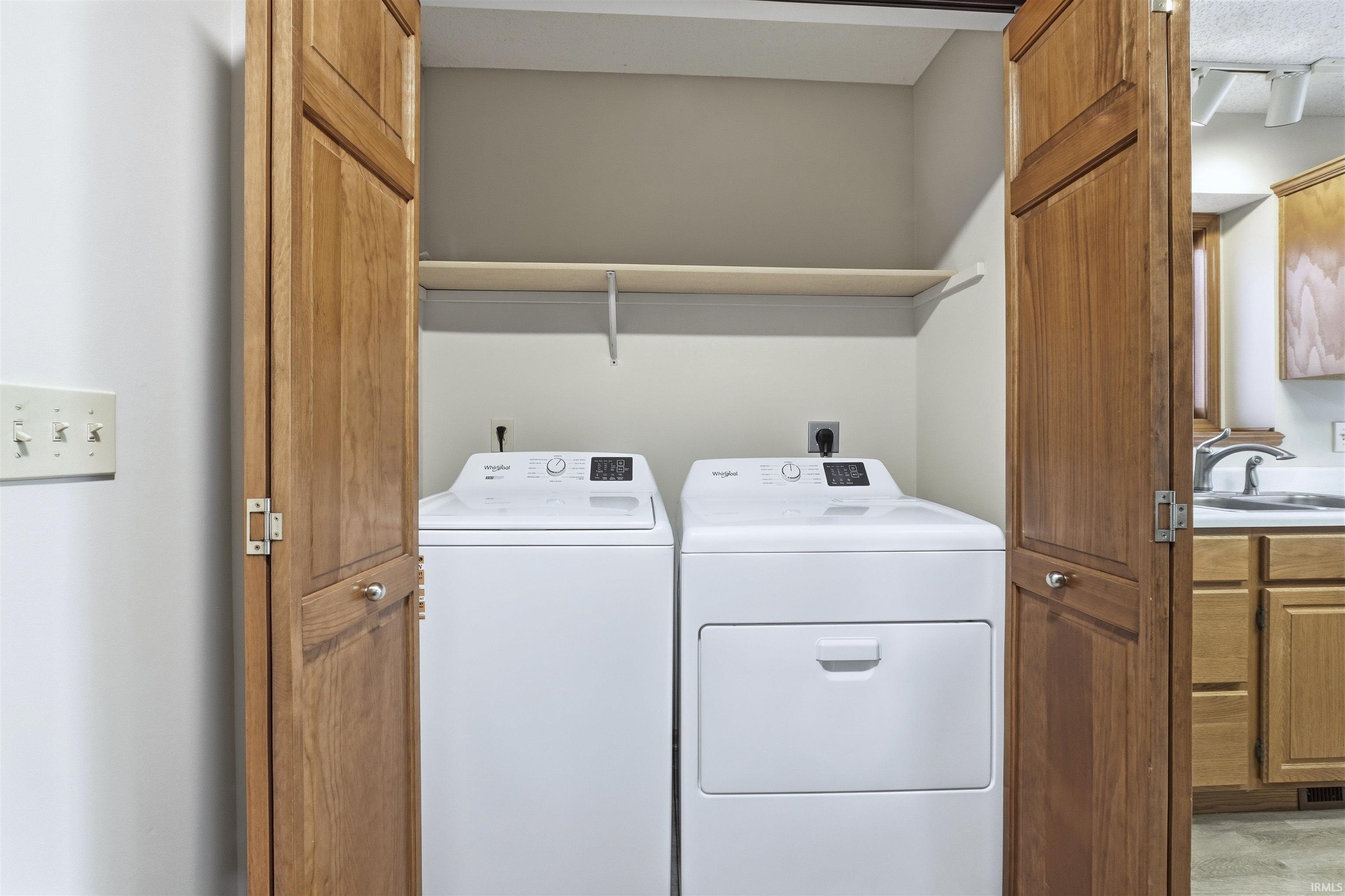 Laundry area with washing machine and dryer
