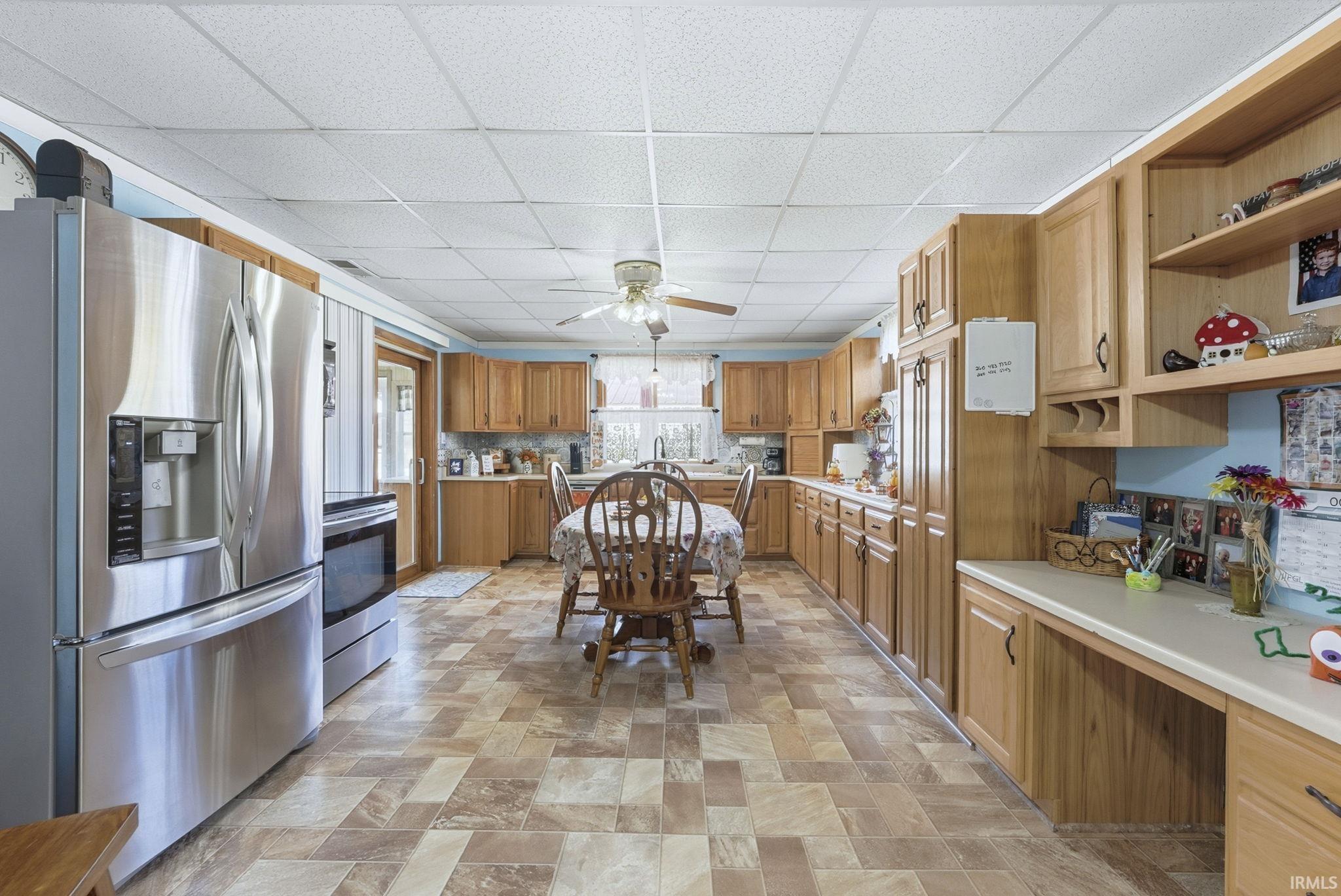 Owners planned on putting in a large island with seating where their current kitchen table sits now. You can definitely see that would work really well in the space.