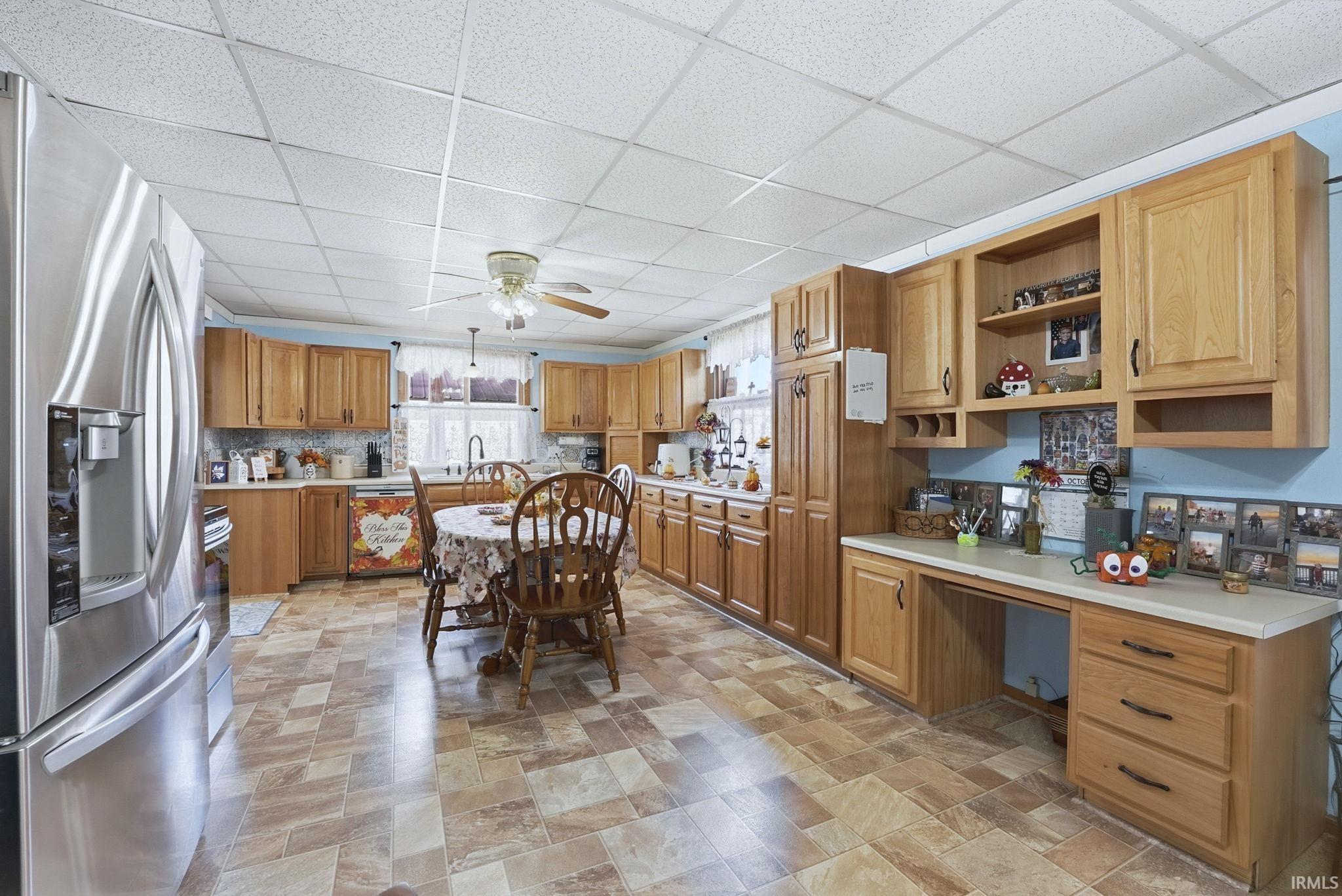 The right wall is nearly 18 feet of cabinets and countertop on just that side. Around 11 feet of countertop.