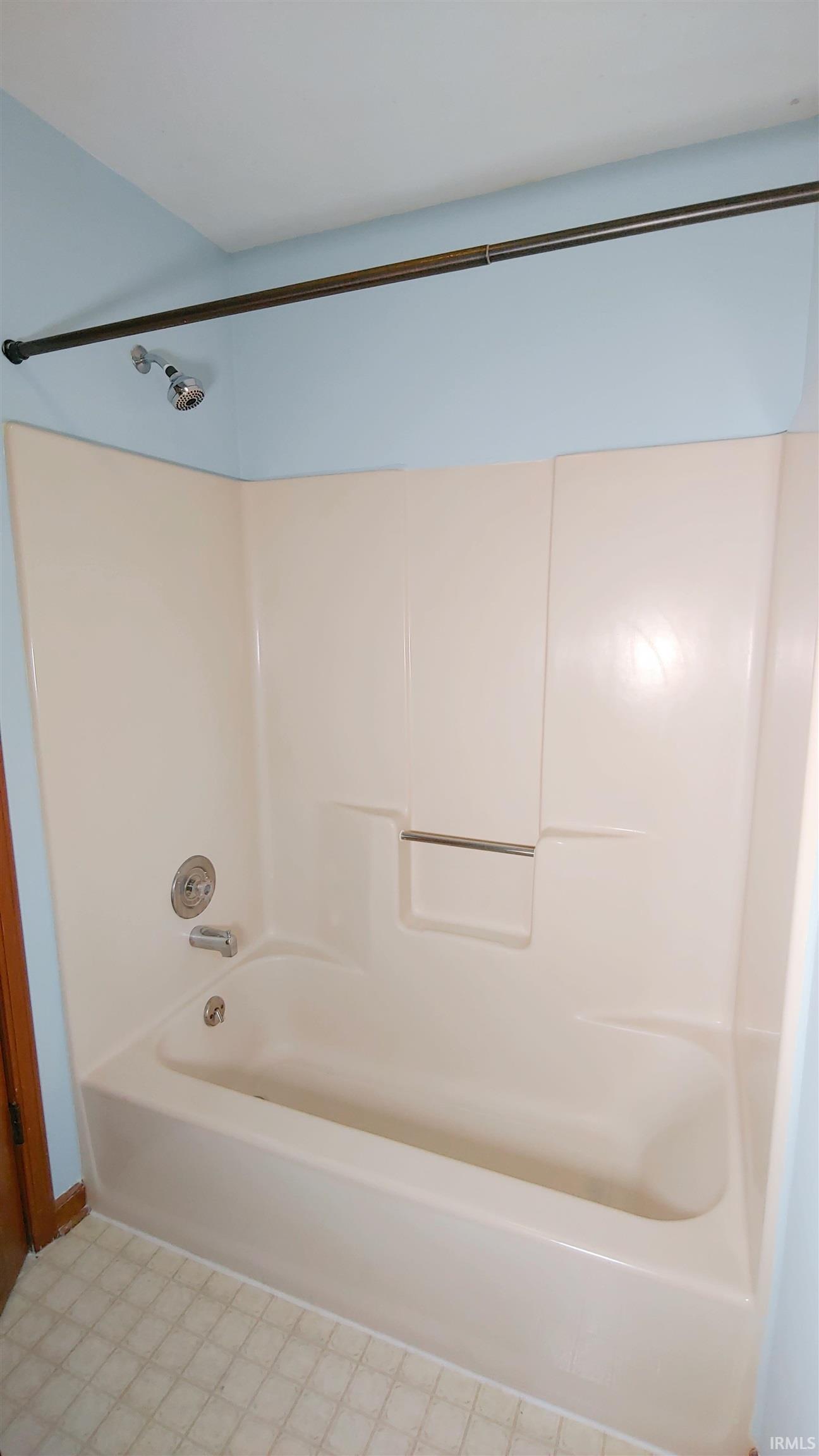 Bathroom featuring tub / shower combination