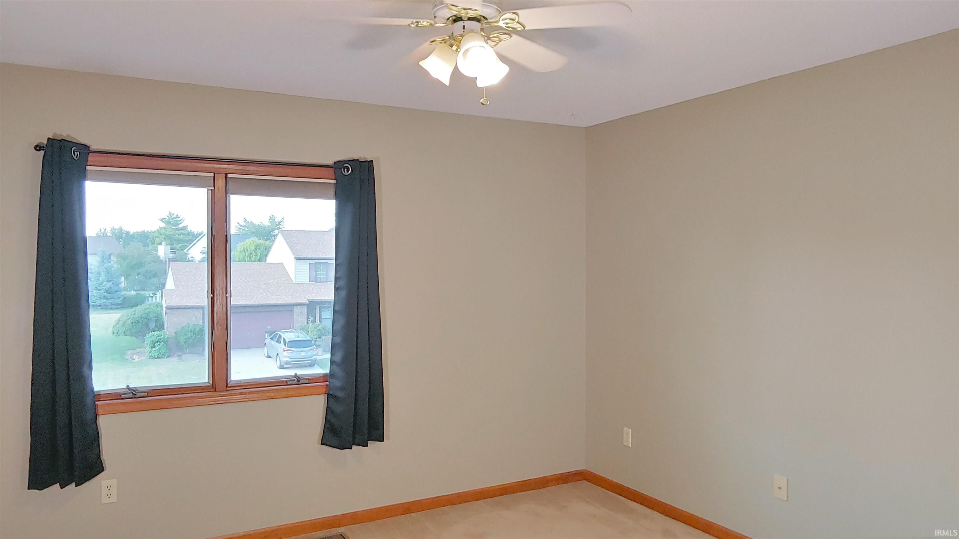 Bedroom 3 featuring carpet and ceiling fan