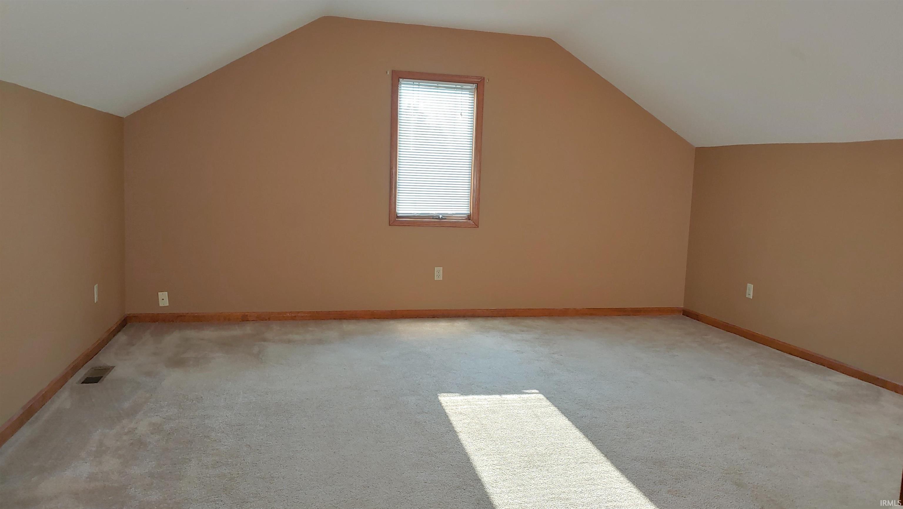Bedroom 4 with vaulted ceiling