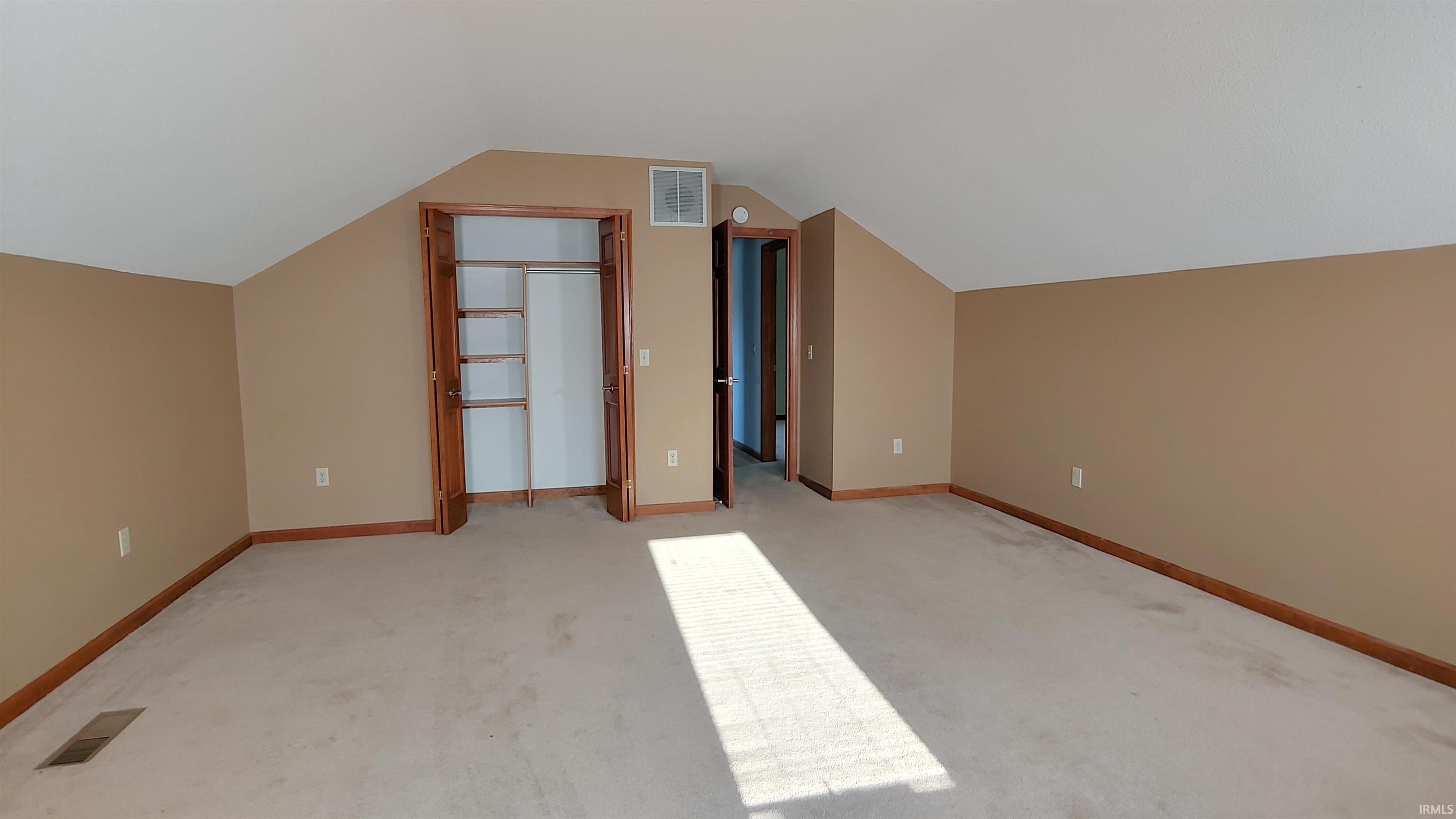 Bedroom 4 with vaulted ceiling