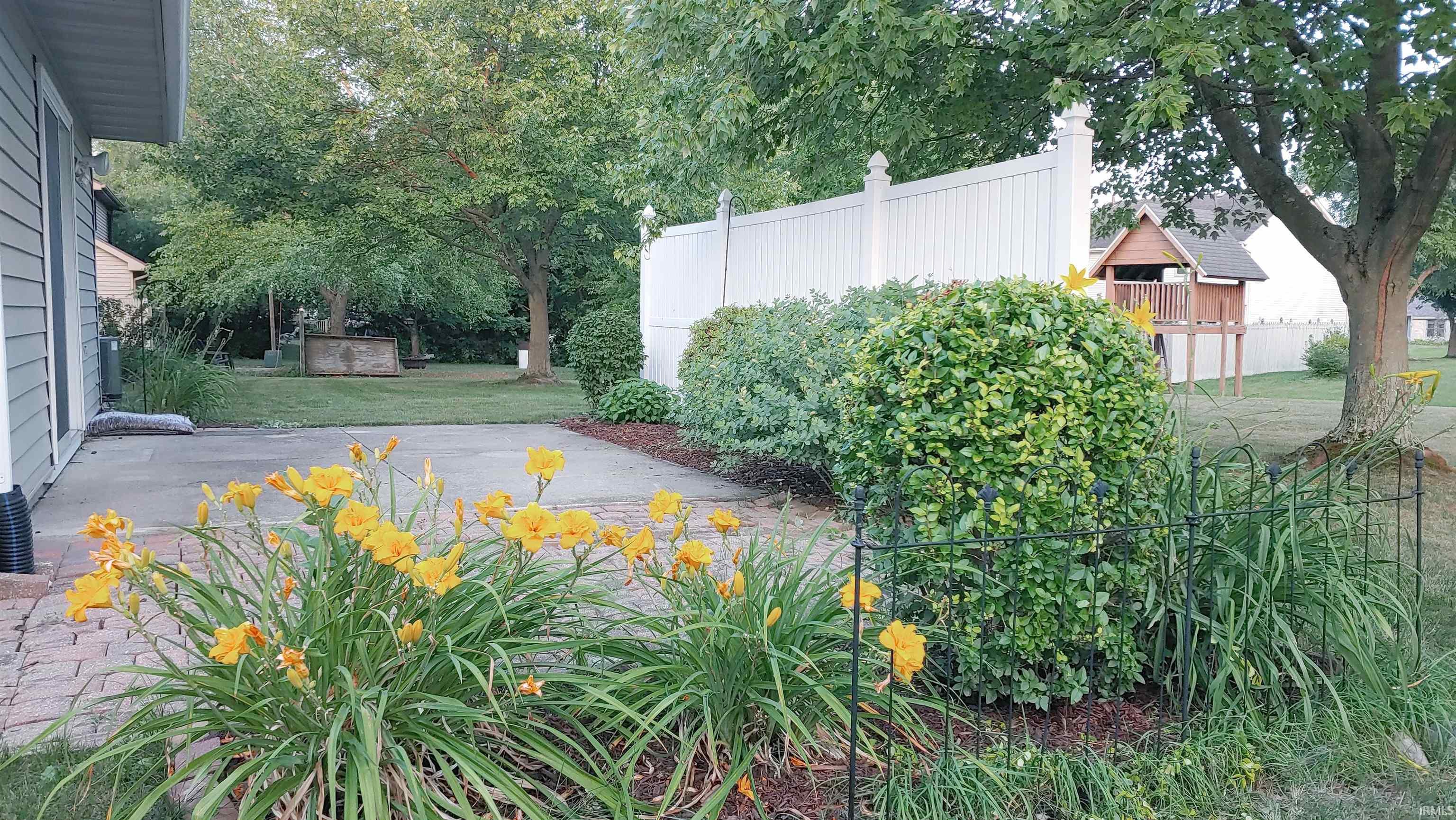 View of yard with a patio area