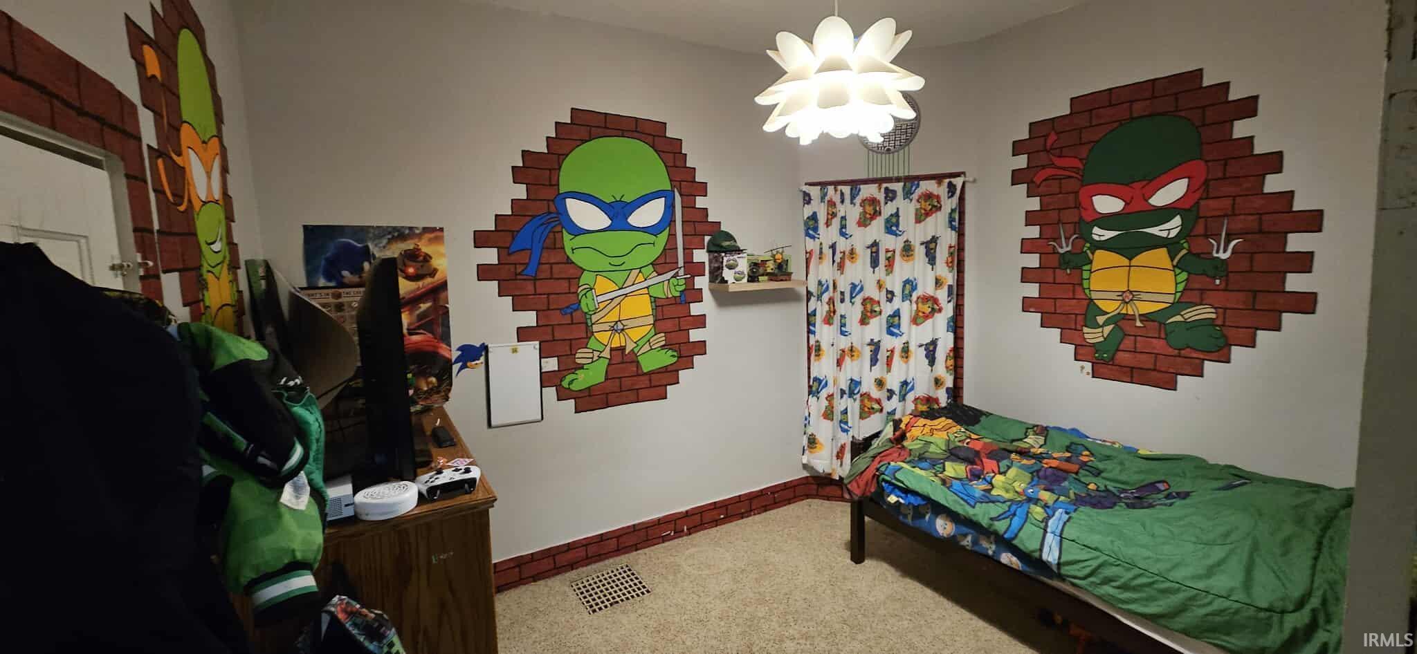 Bedroom with baseboards and carpet flooring